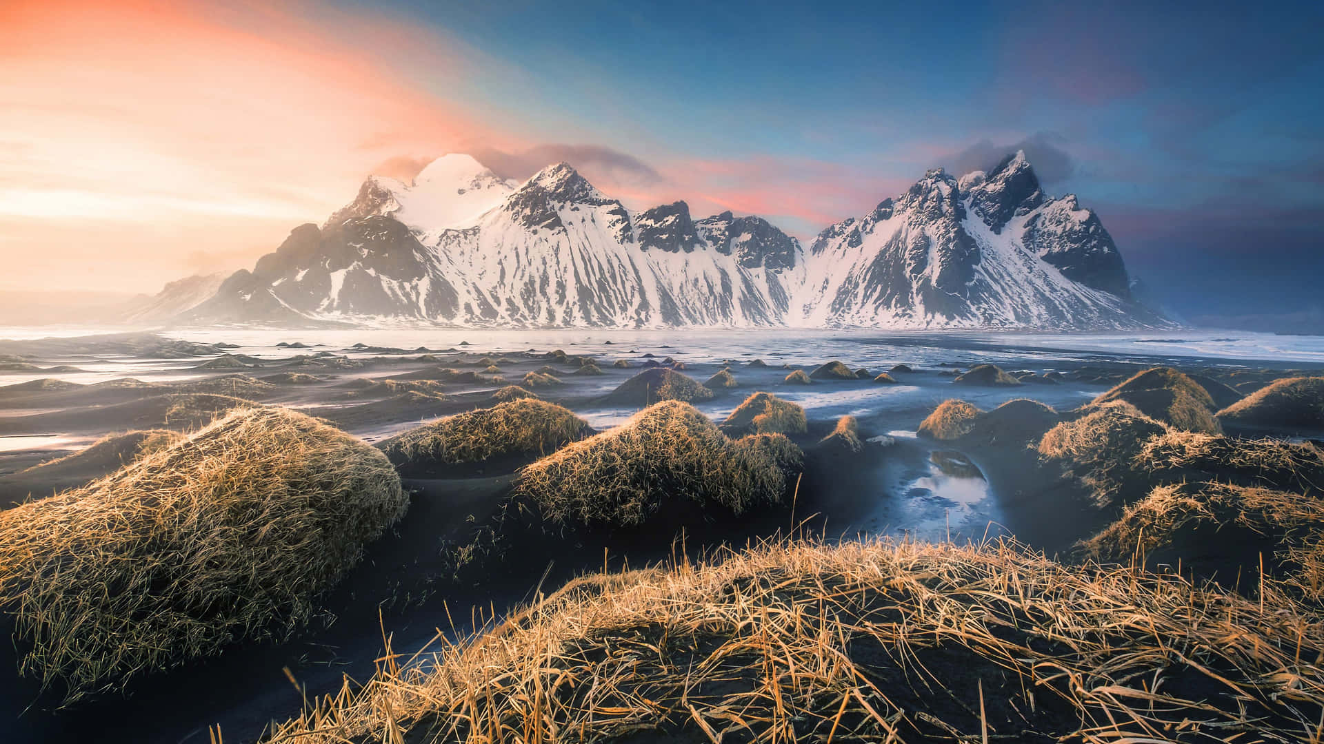 A breathtaking vista of Iceland's majestic glaciers and cliffs Wallpaper