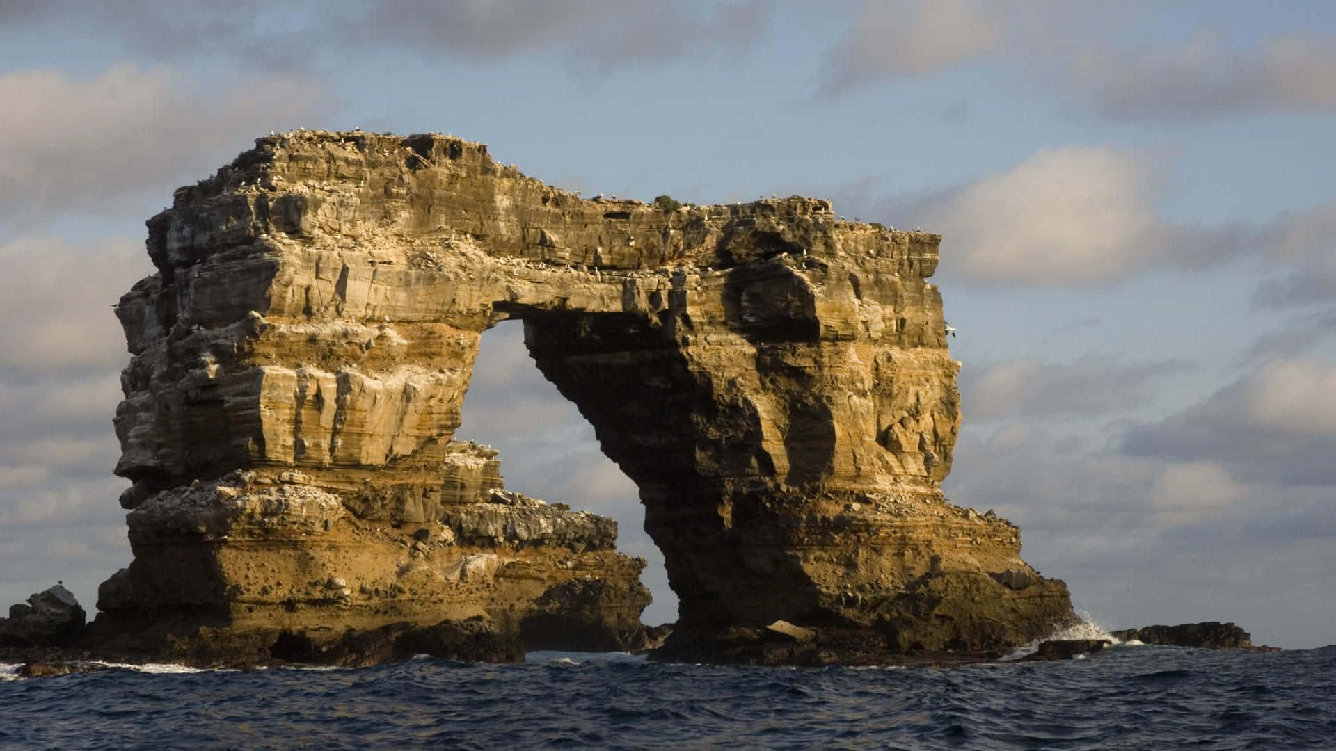 Iconic Darwin Arch In Galapagos Islands Wallpaper