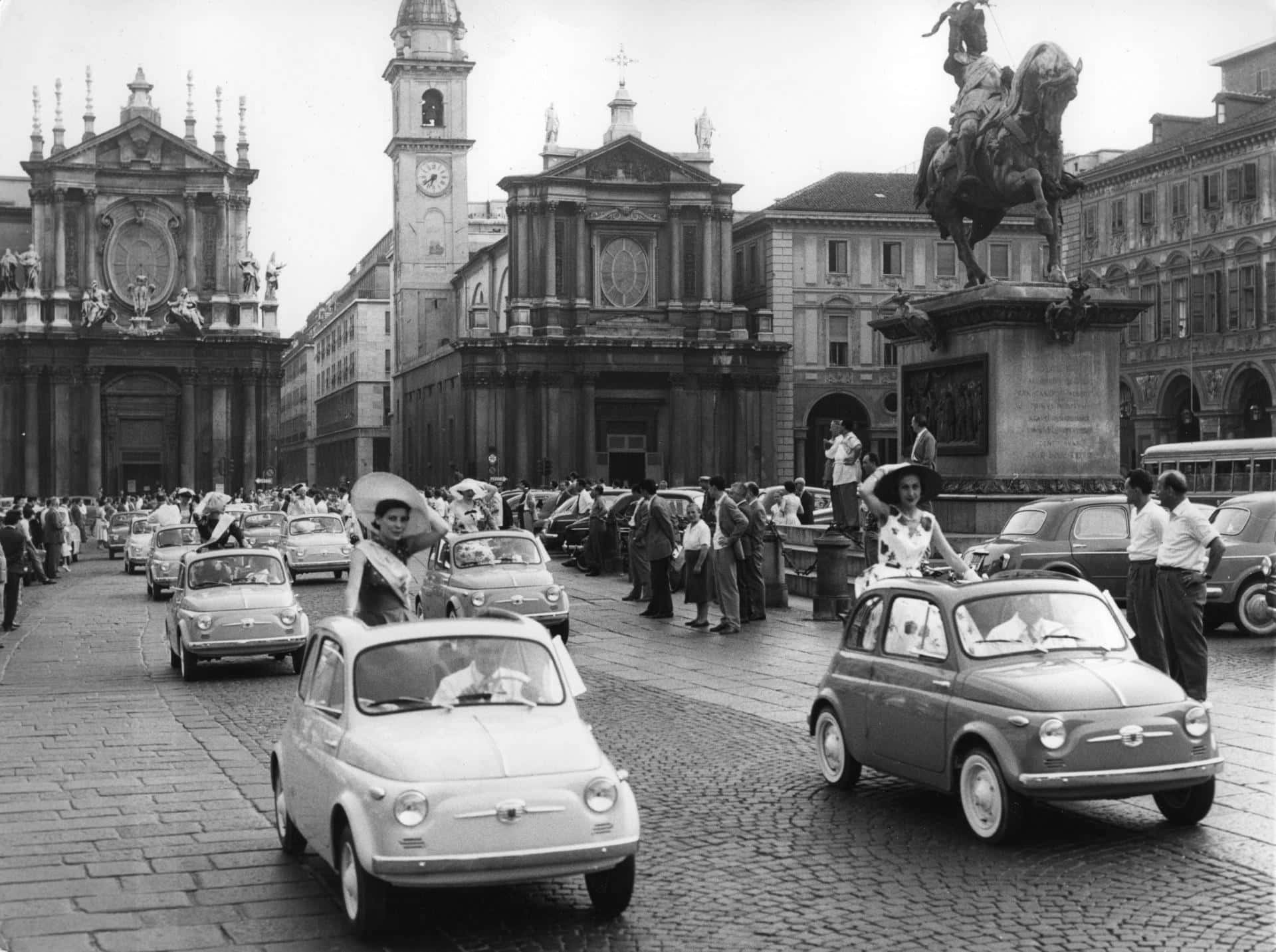 Iconic Fiat Cinquecento Cruising The Road Wallpaper