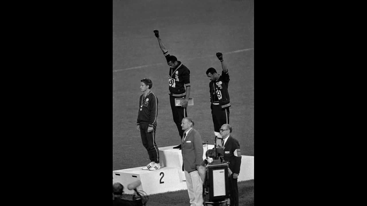 Ikonisk 1968 Ollympiske Black Power Salut Billede skaber en strålende vision.