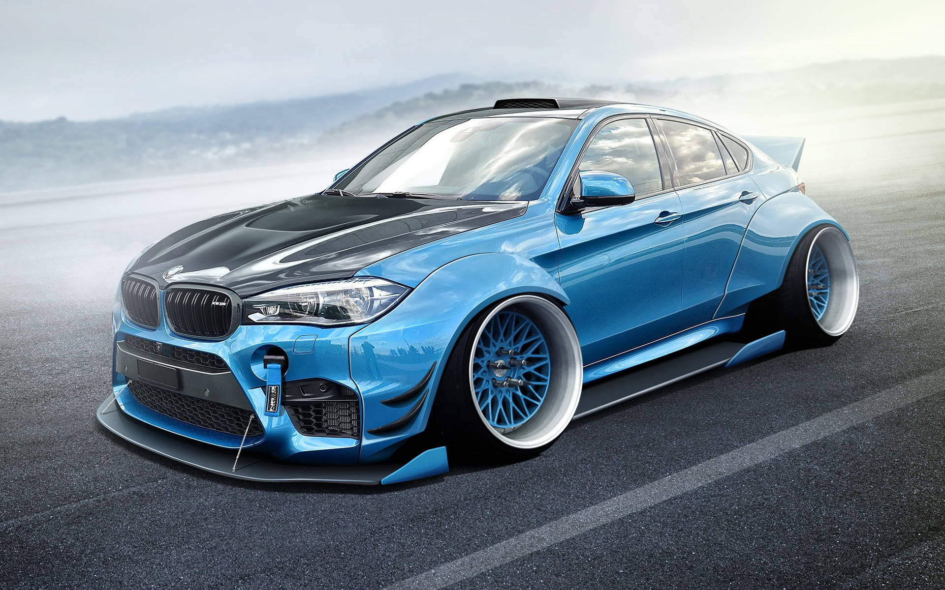 Majestic BMW X6 M in Icy Blue Color Wallpaper