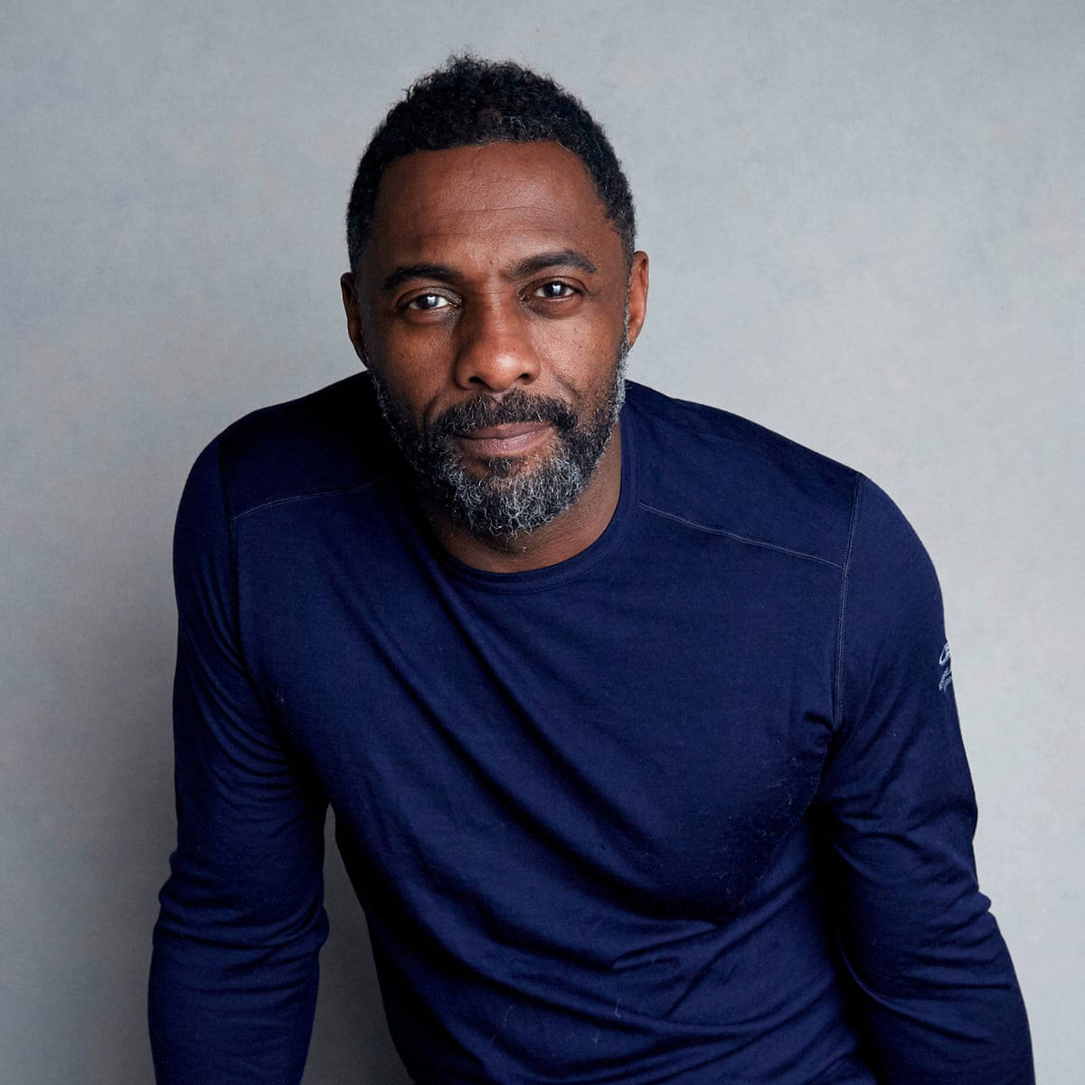 Idris Elba With Blue Sweater Wallpaper