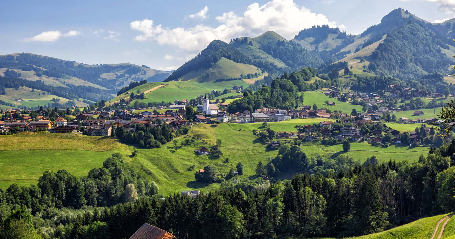 Idyllic Swiss Village Summer Scenery Wallpaper