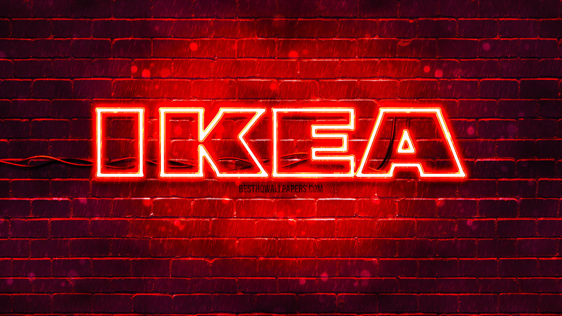 The renowned IKEA logo in vibrant red LED signage against a unique brick accent wall. Wallpaper