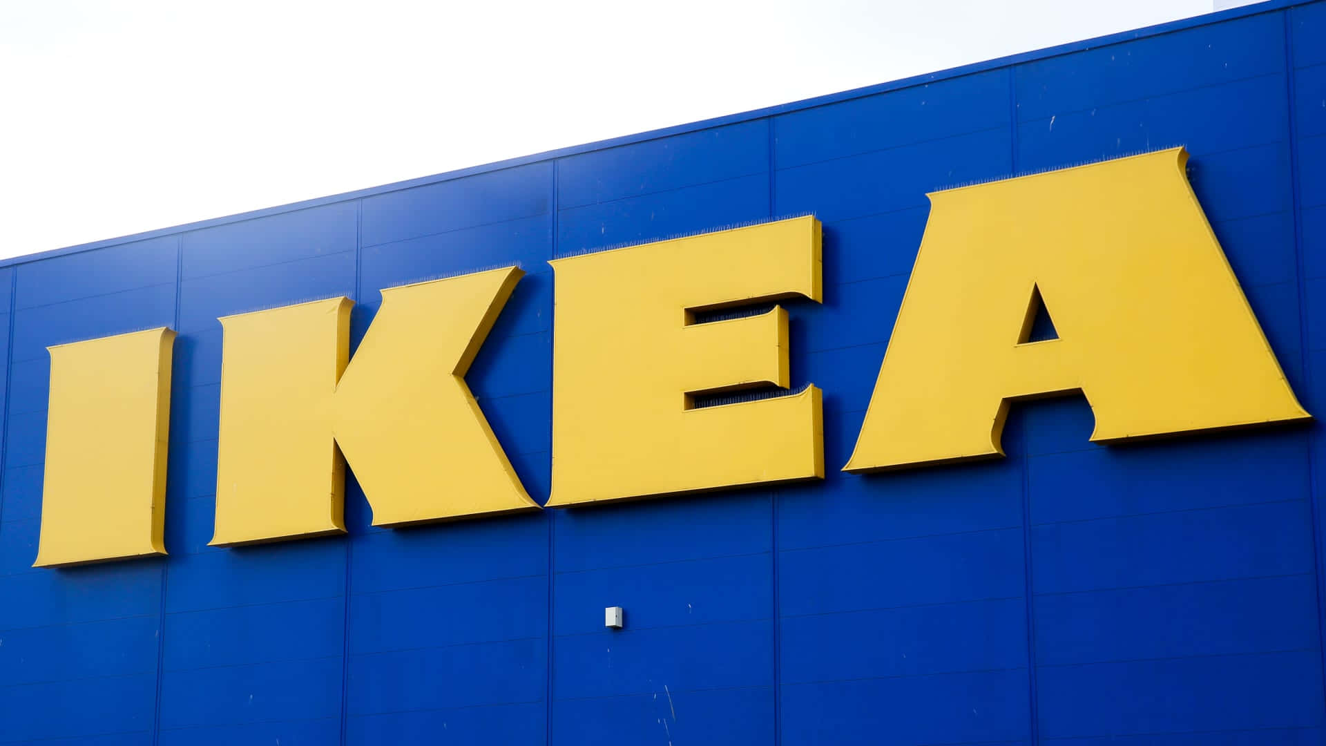 Ikea's New Logo Is Shown On The Side Of A Building