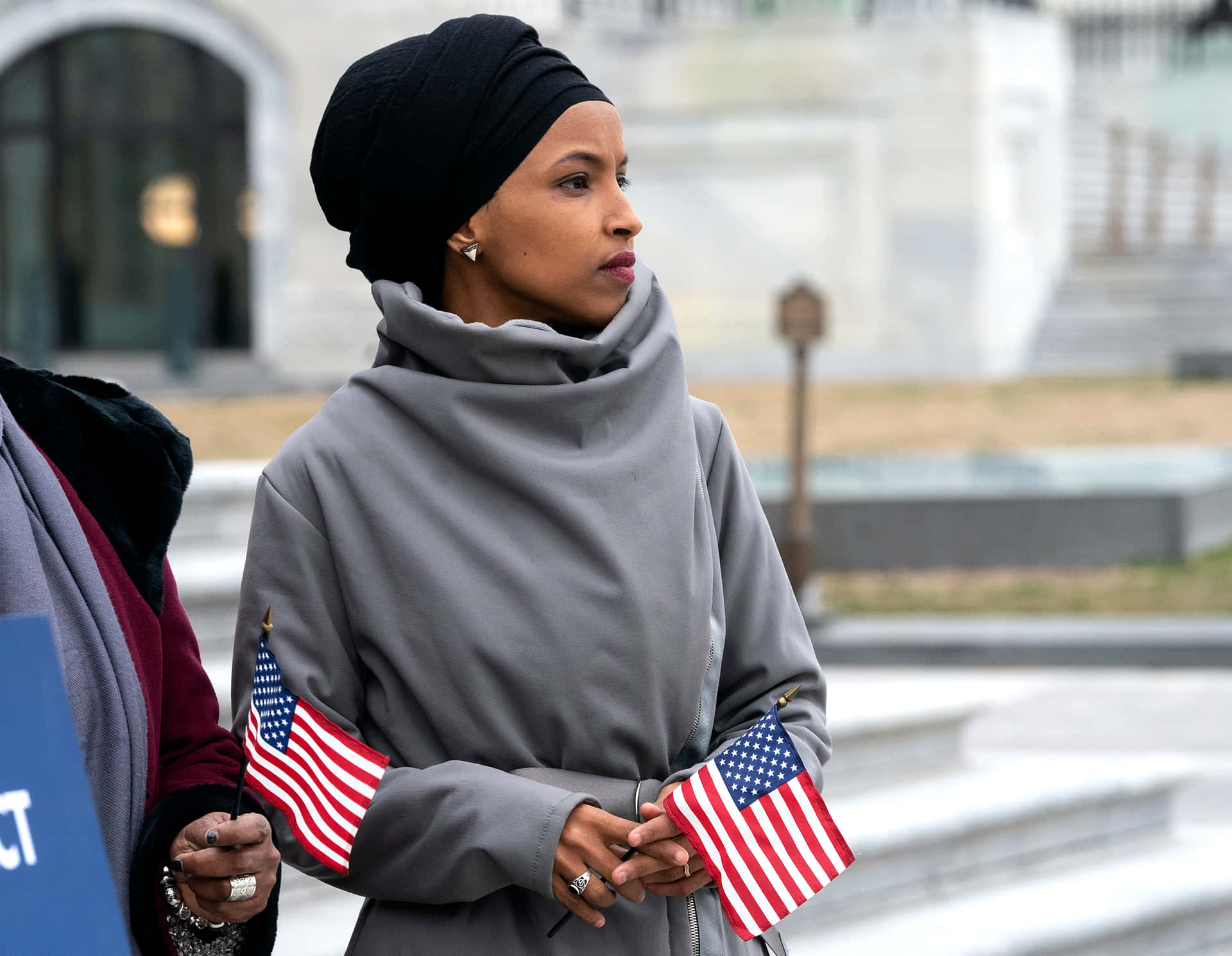 Representative Ilhan Omar Carrying United States Flags Wallpaper
