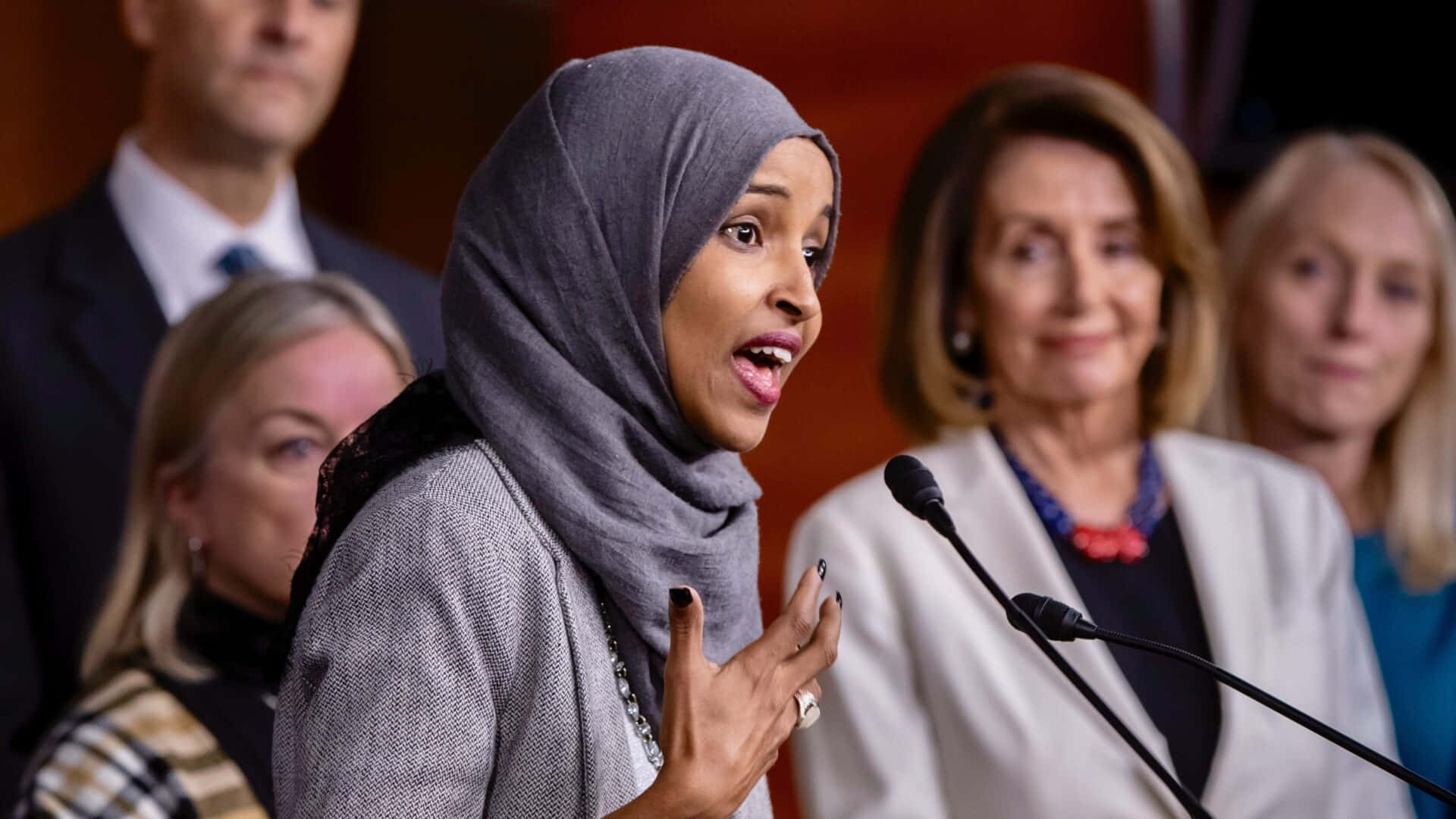Ilhan Omar Speaking To The Public Wallpaper