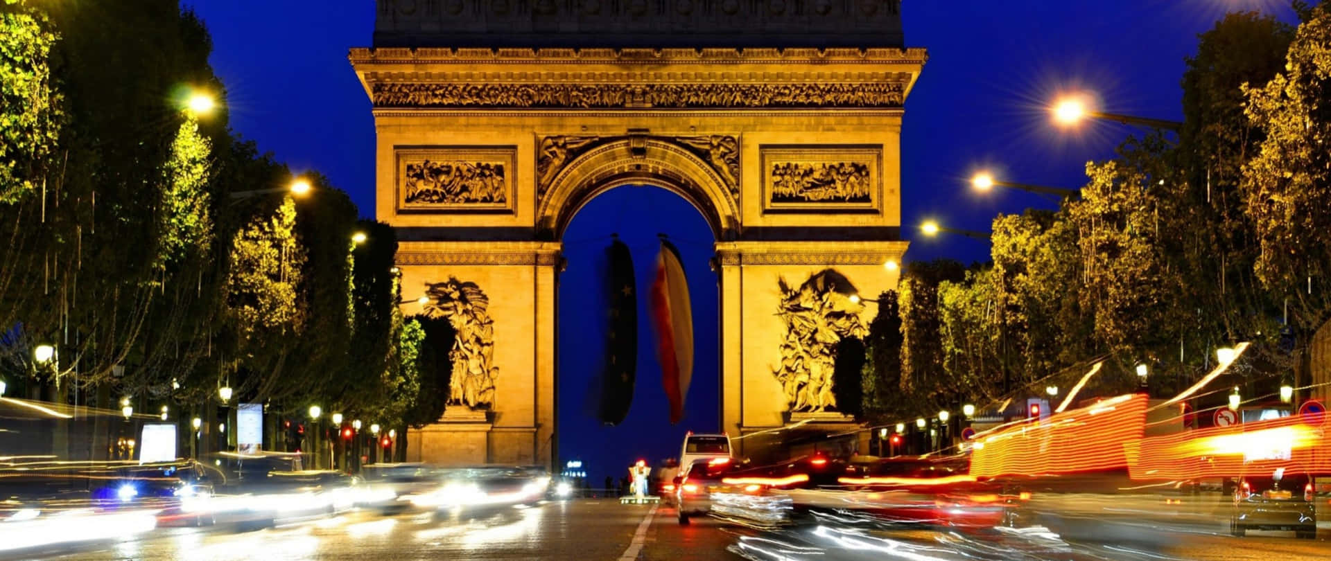 Illuminated Arch In Paris Wallpaper