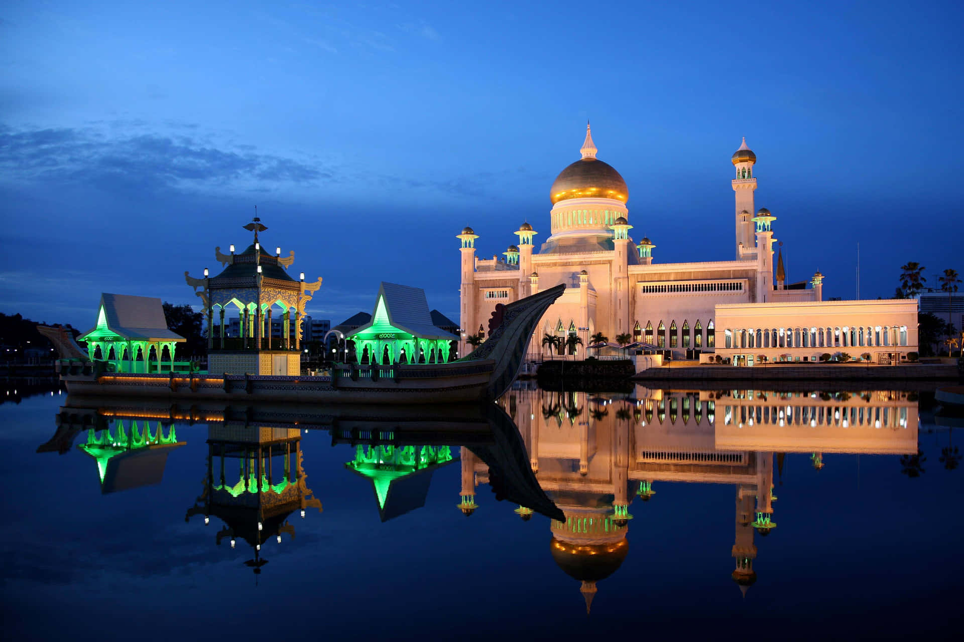 Illuminated Mosque Reflectionat Twilight Wallpaper