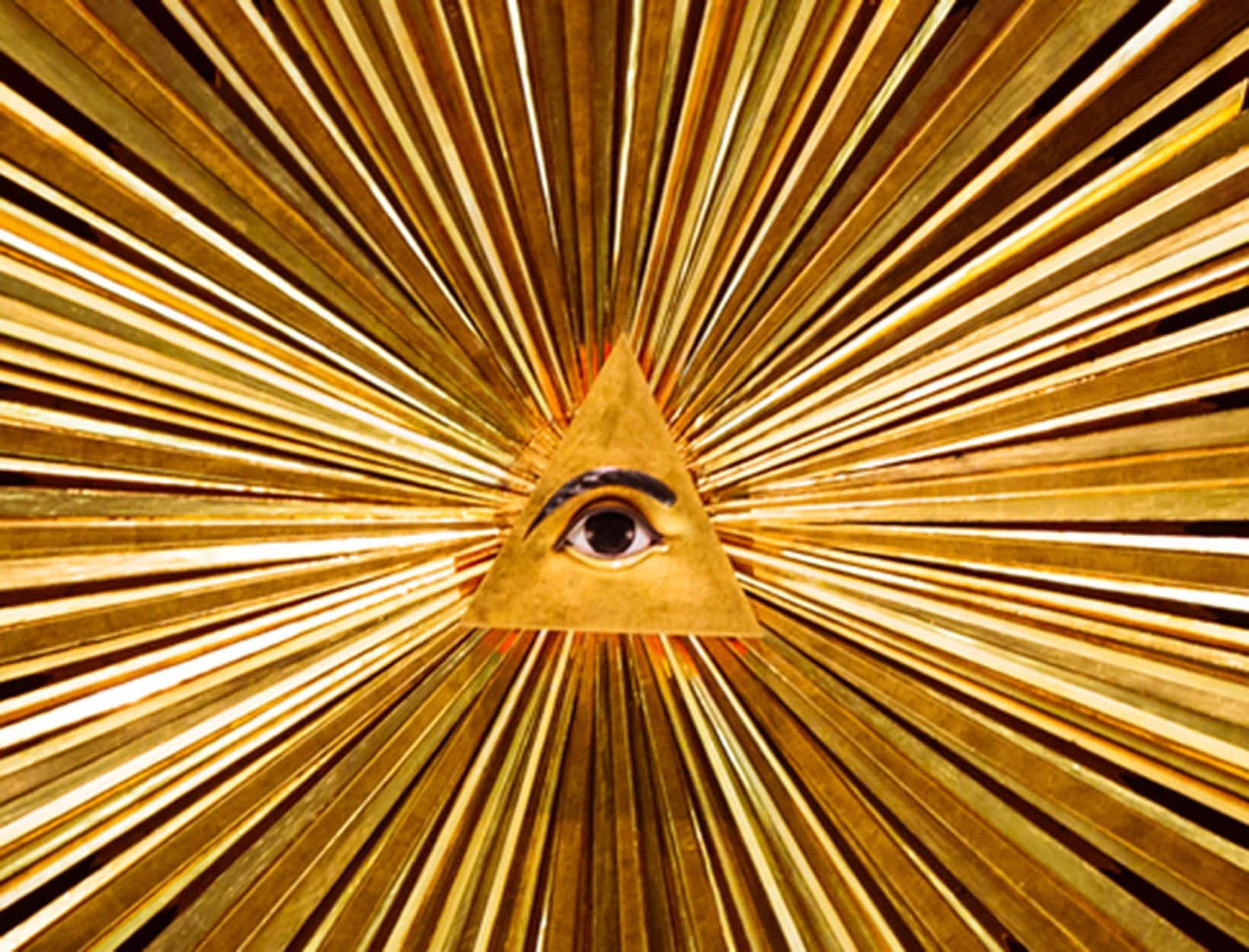 A Golden Eye With Rays Of Light
