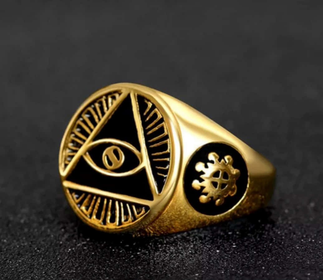 A Gold Ring With An Eye Symbol