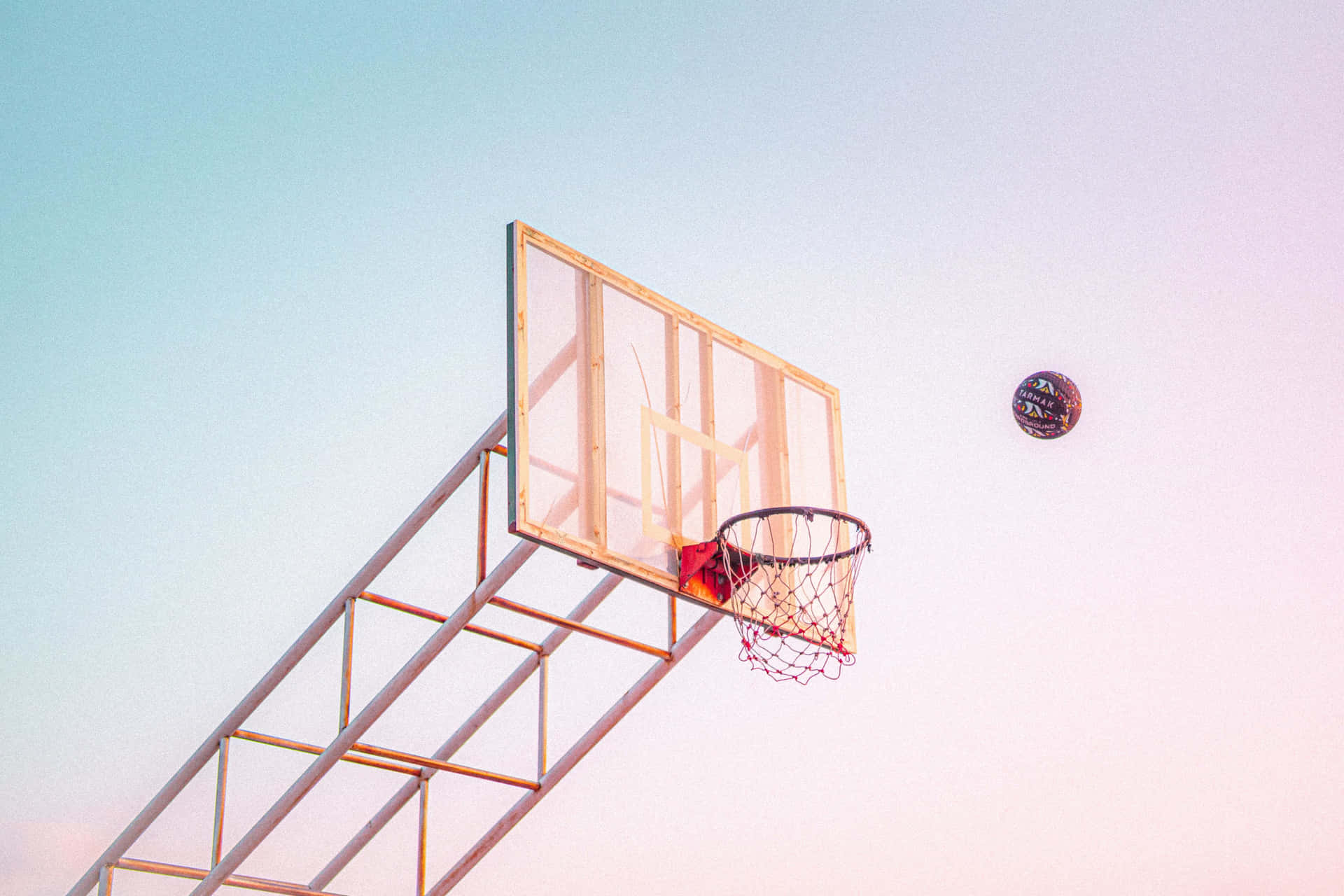 a basketball hoop with a basketball in it