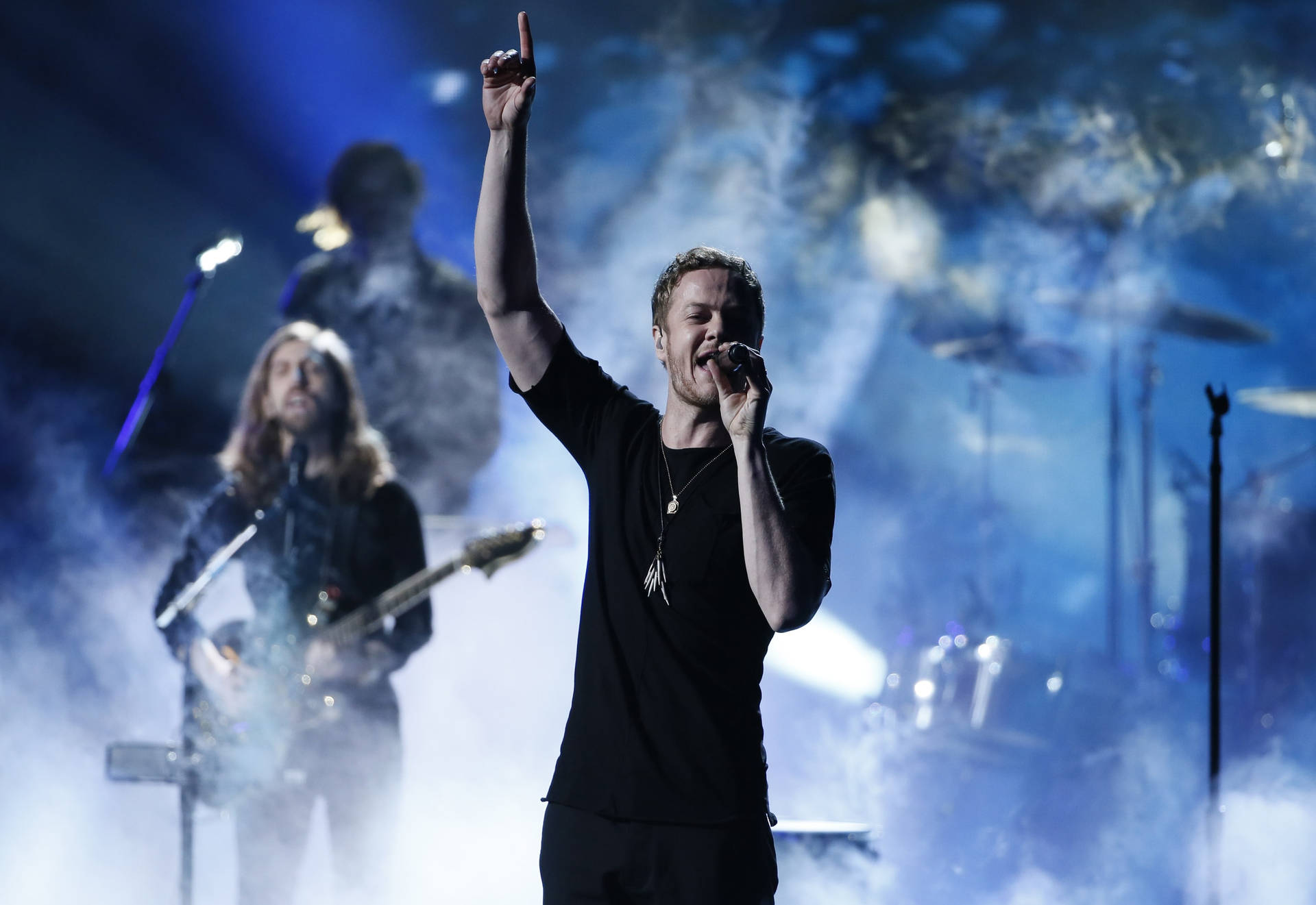 Imagine Dragons At Smoky Stage Background