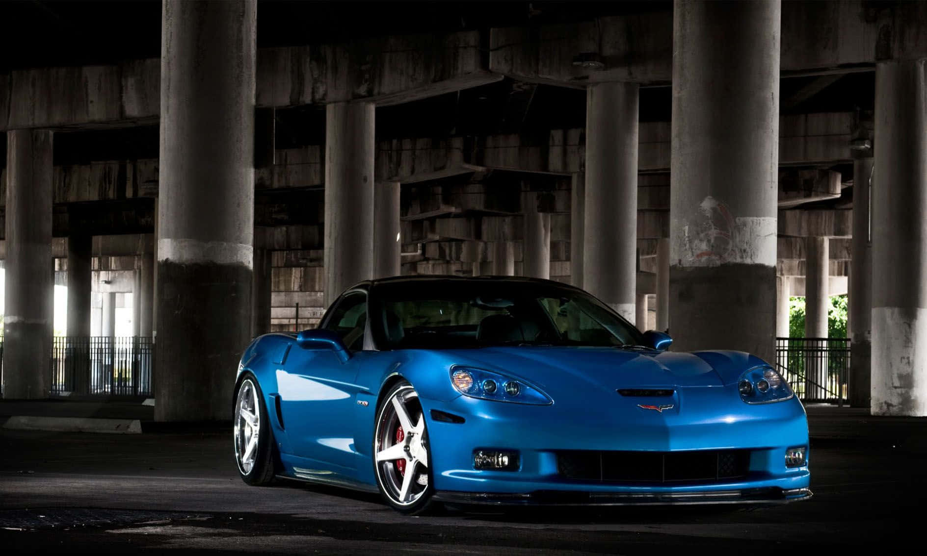 Impeccable Chevrolet Corvette C6 On The Road Wallpaper