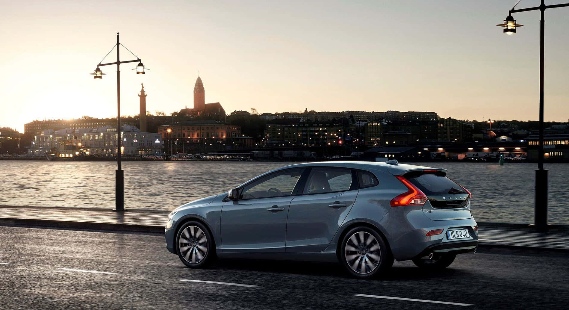 Impeccably Designed Volvo V40 Embracing The Open Road Wallpaper