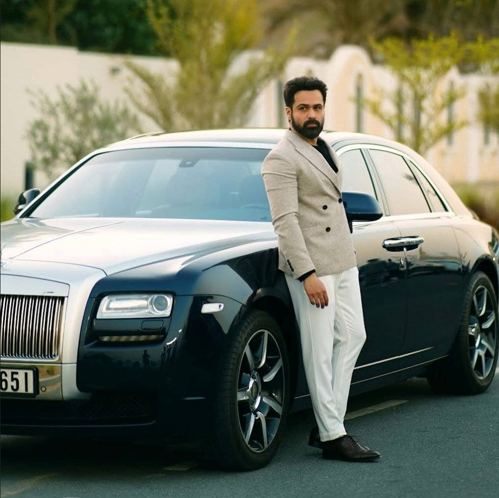 Imran Hashmi Posing with His Luxury Car Wallpaper