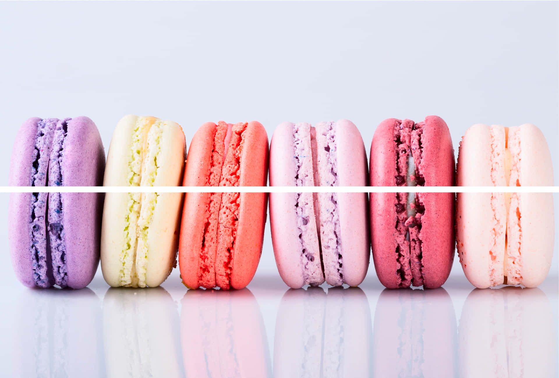 Captivating Array of Colorful Macarons Wallpaper