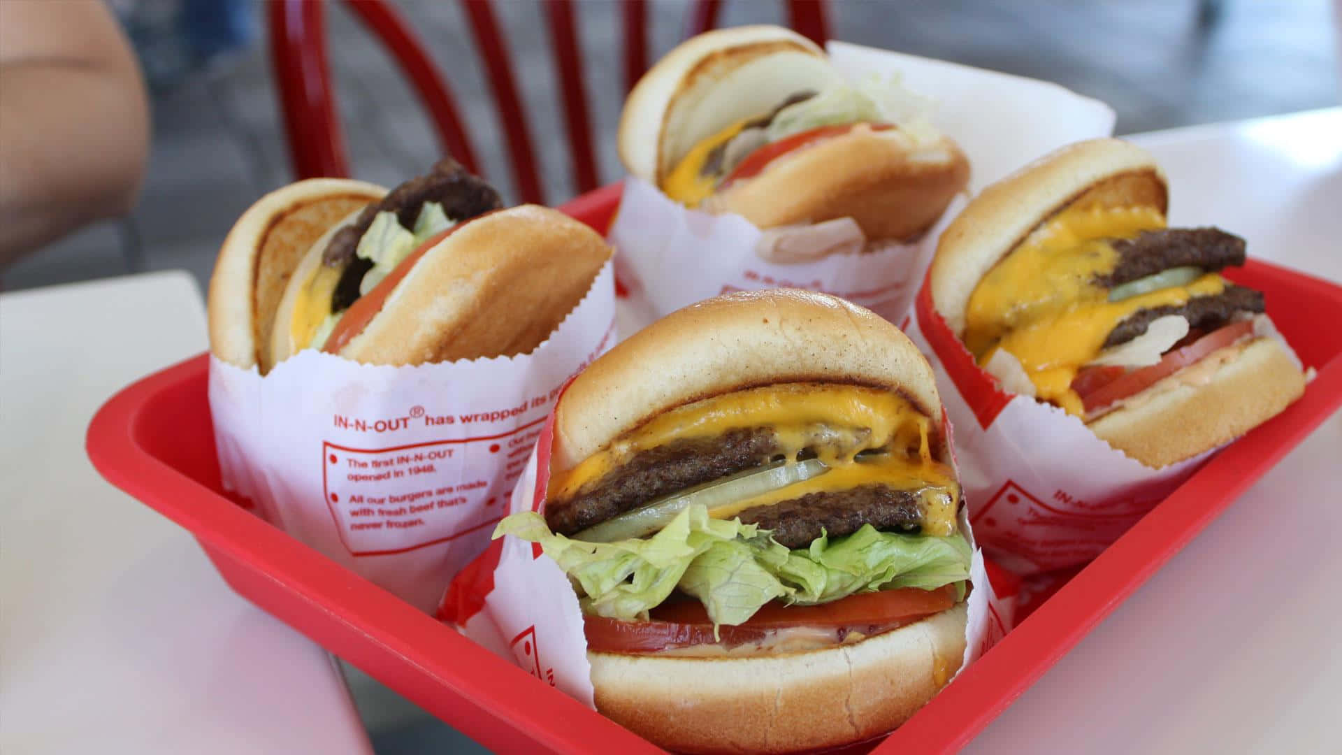 A Tray Of Hamburgers In A Red Basket Wallpaper