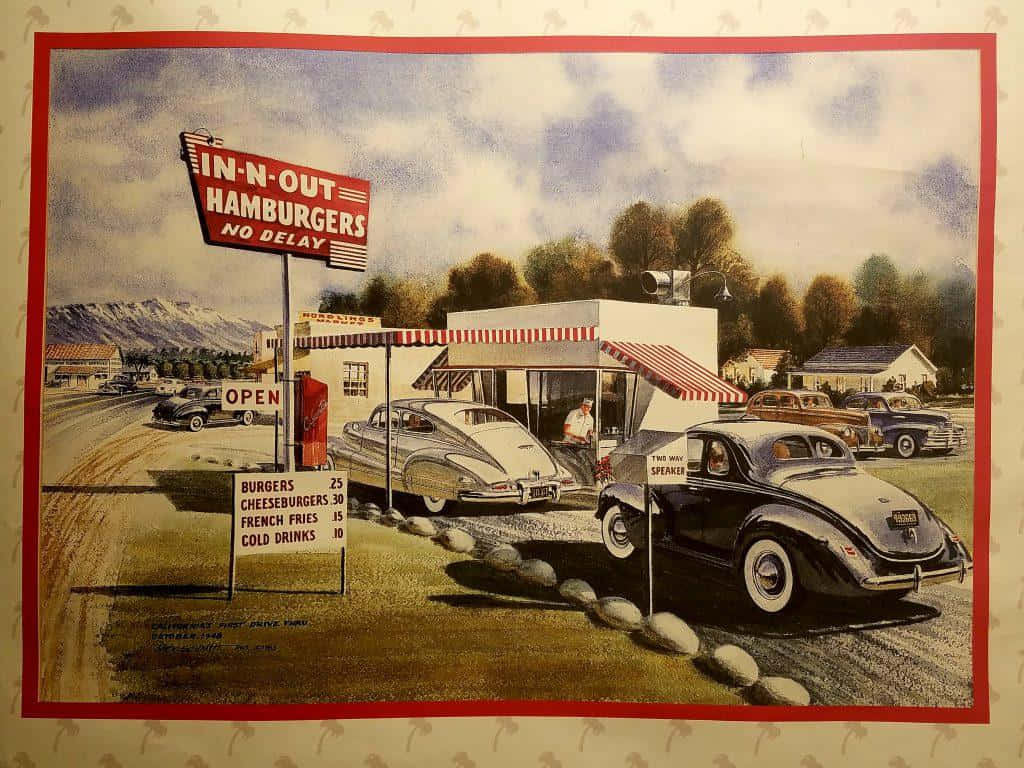 Et billede af en diner med biler parkeret udenfor. Wallpaper