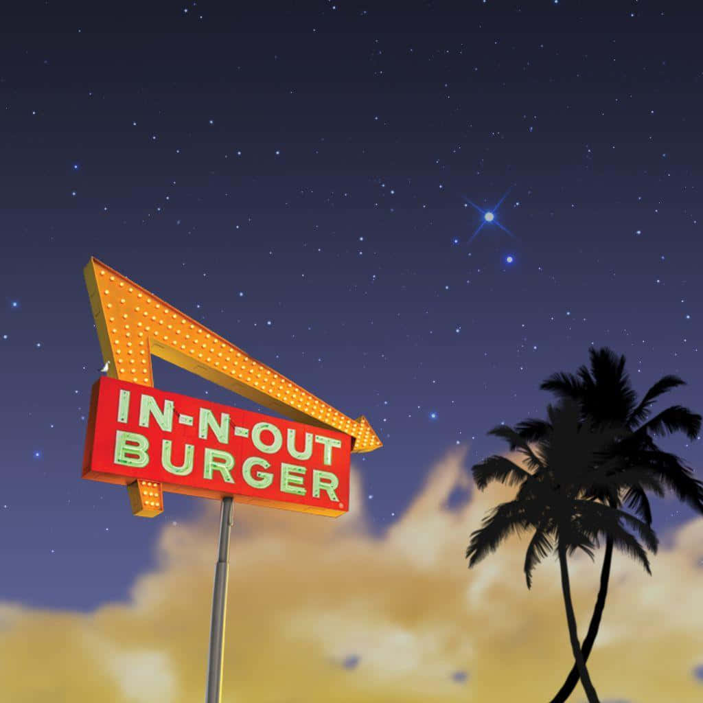 A Neon Sign With Palm Trees And A Starry Sky Wallpaper