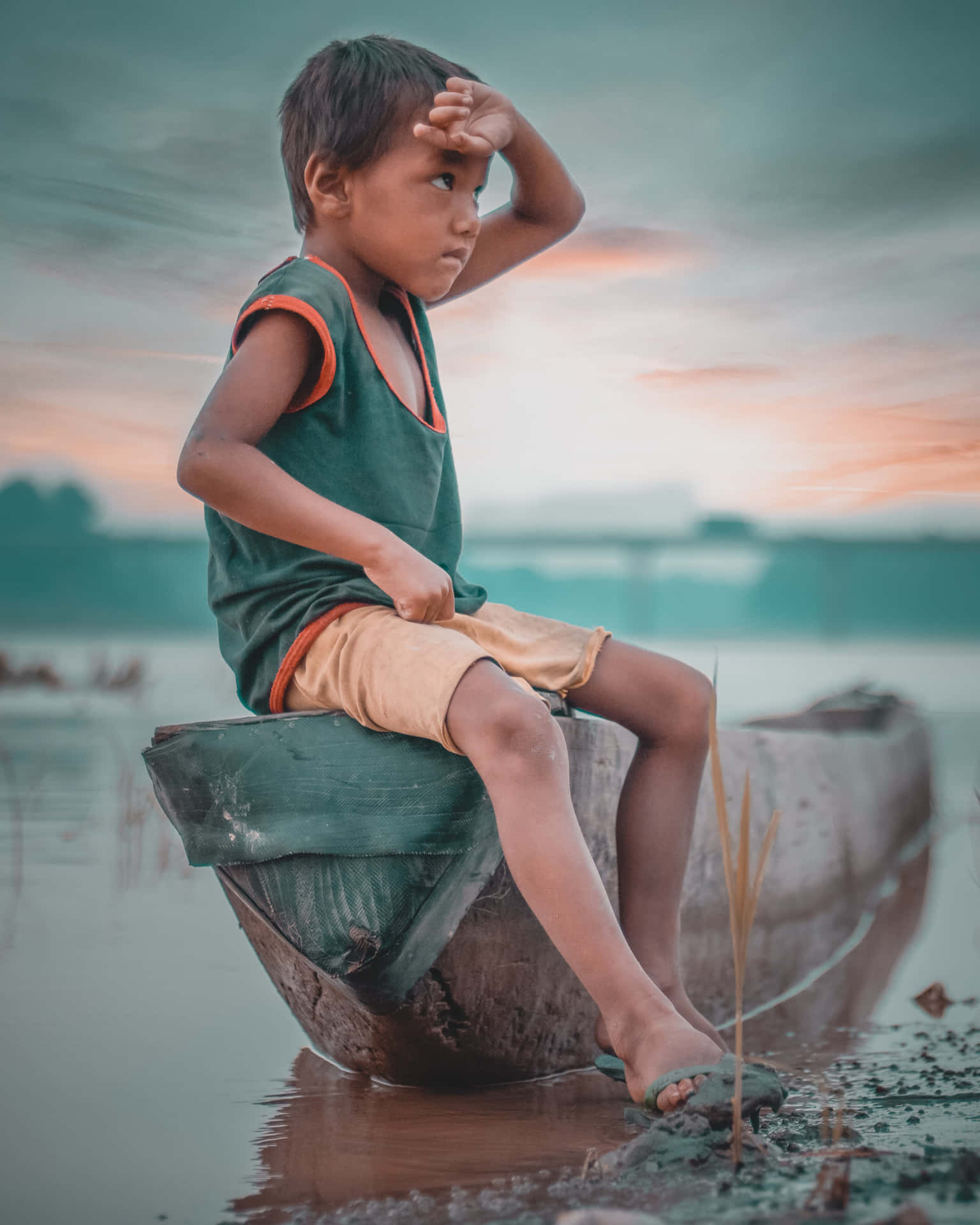 Inadequate Kid In Old Boat Wallpaper