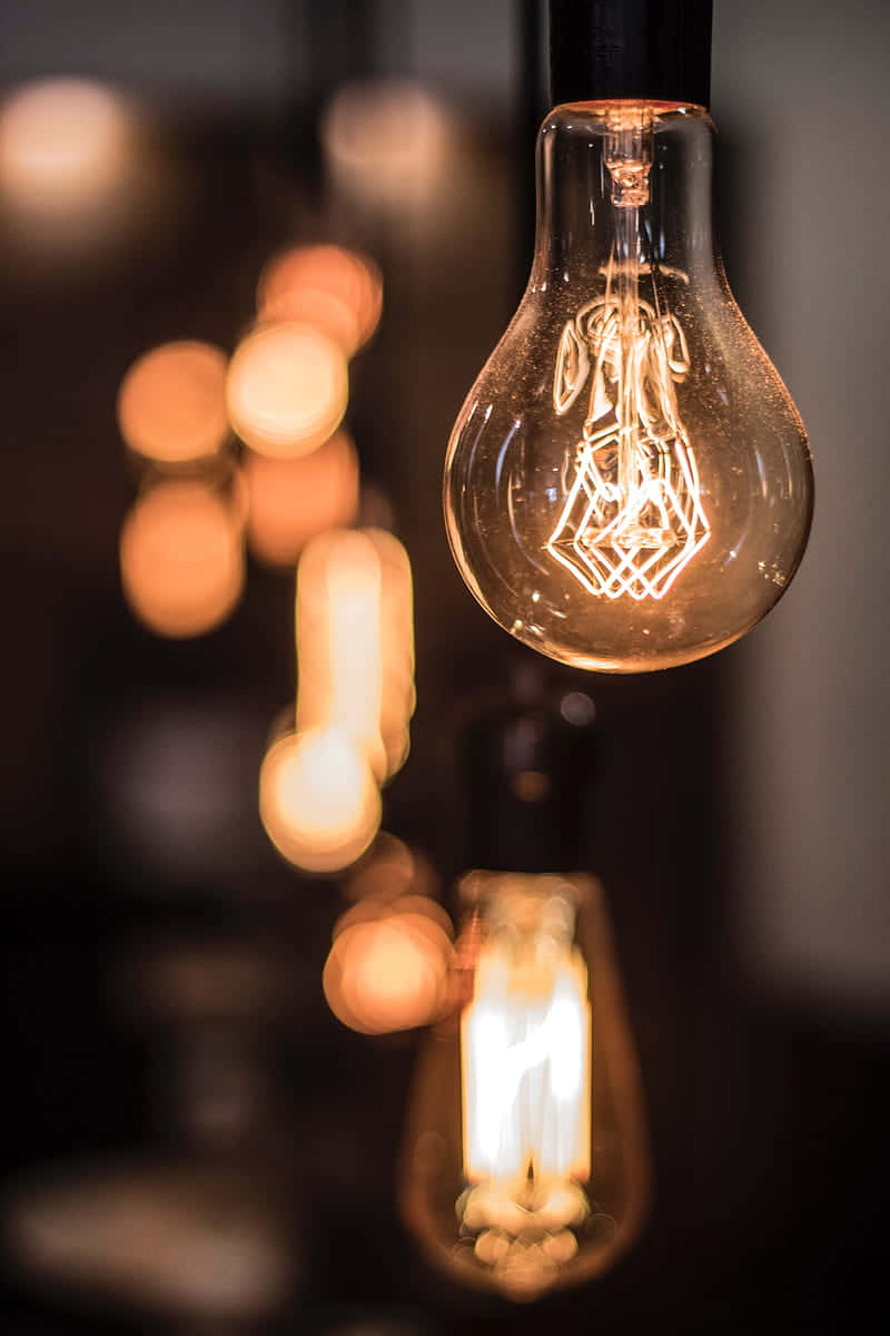 Incandescent Bulb With Abstract Filament Wallpaper