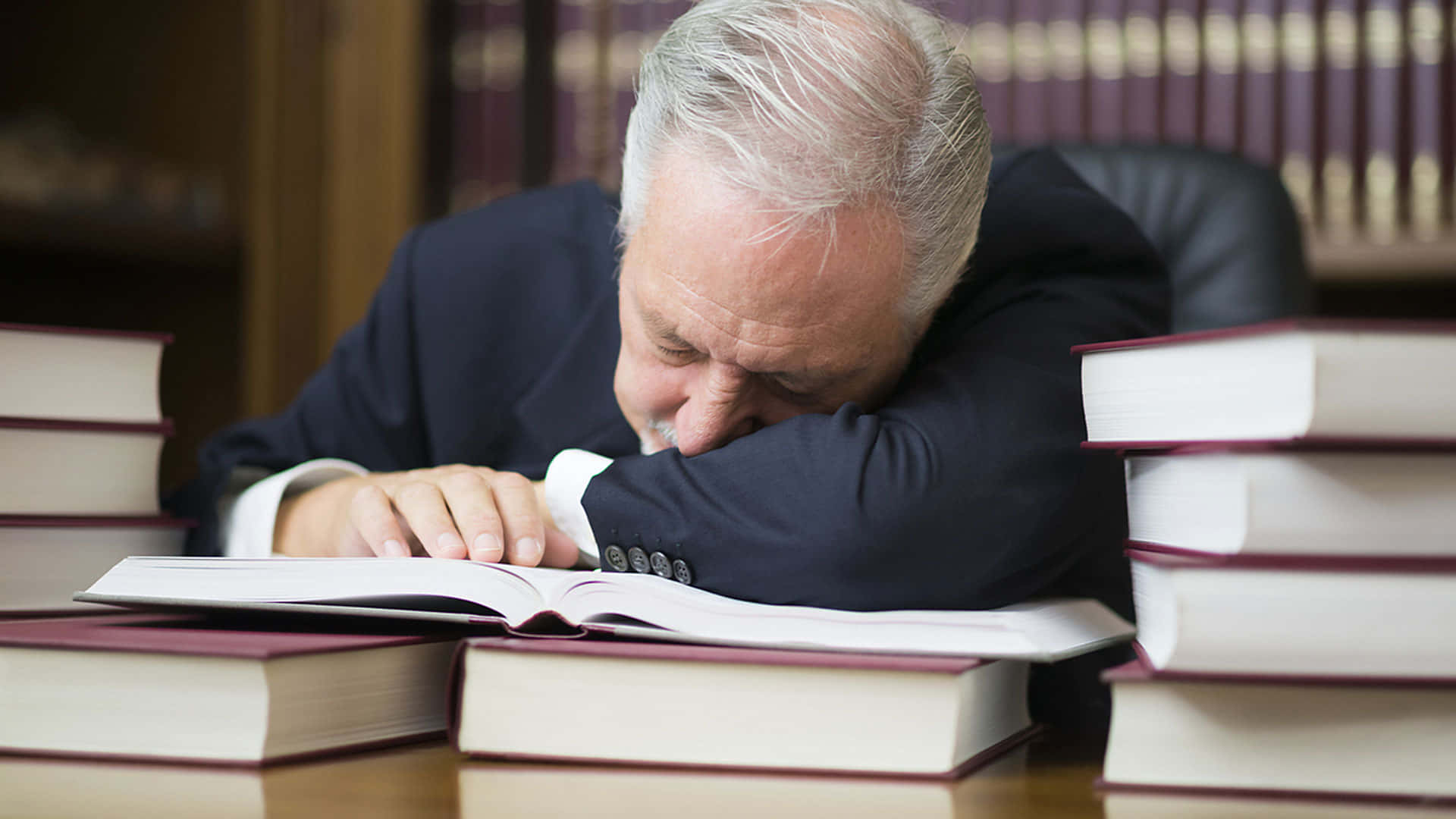 Disengaged Lawyer Asleep at Work Wallpaper