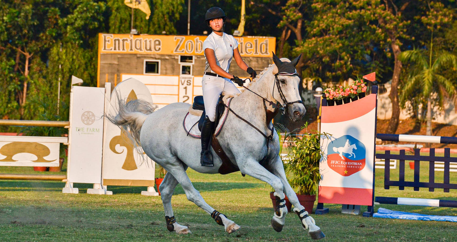 Incredible Female Equestrian Horseback Riding Training Wallpaper