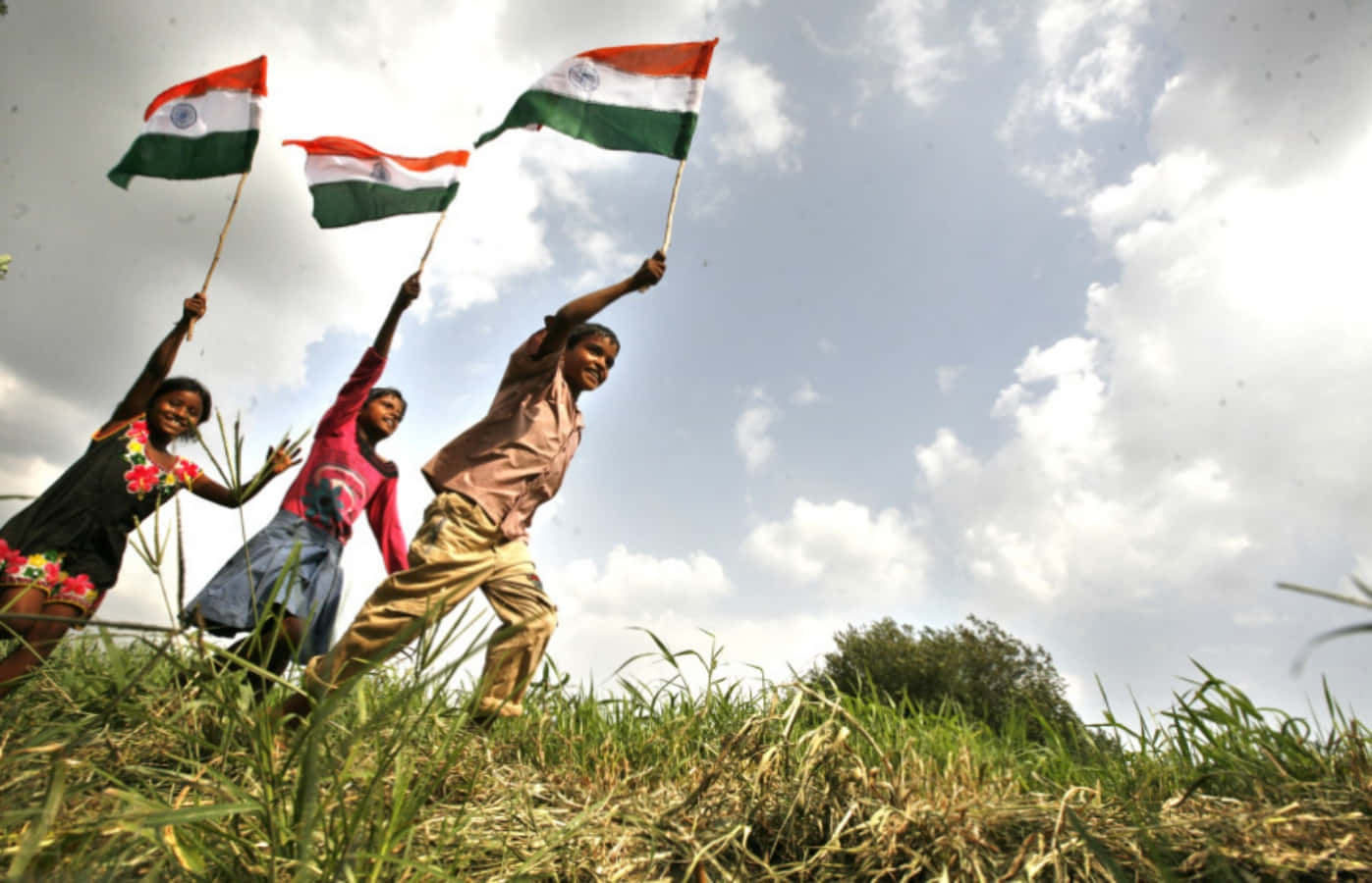 Díade La Independencia De La India. Imagen De Niños Con La Bandera India.