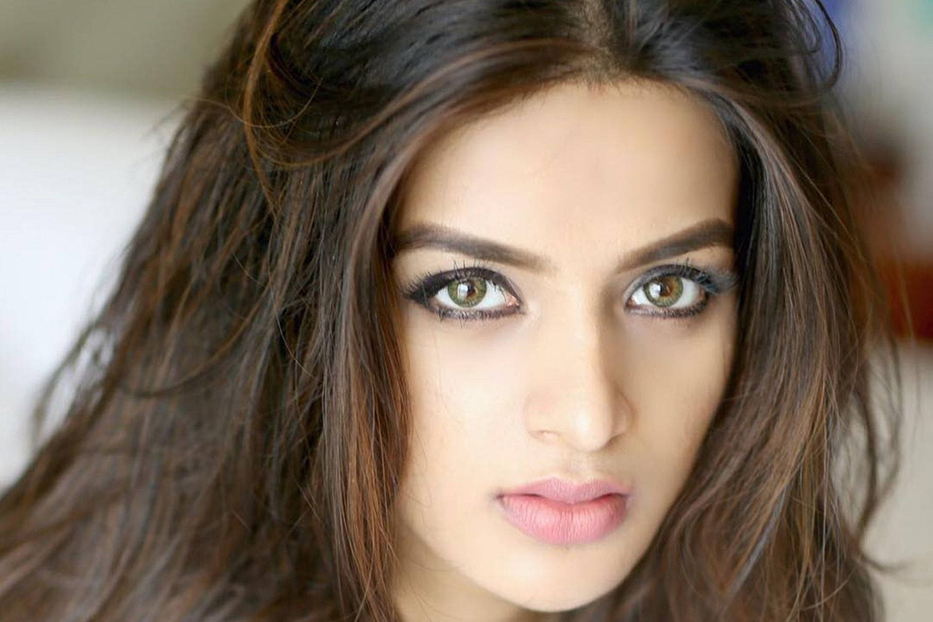 Indian Actress Nidhi Agarwal Alluring Face Wallpaper