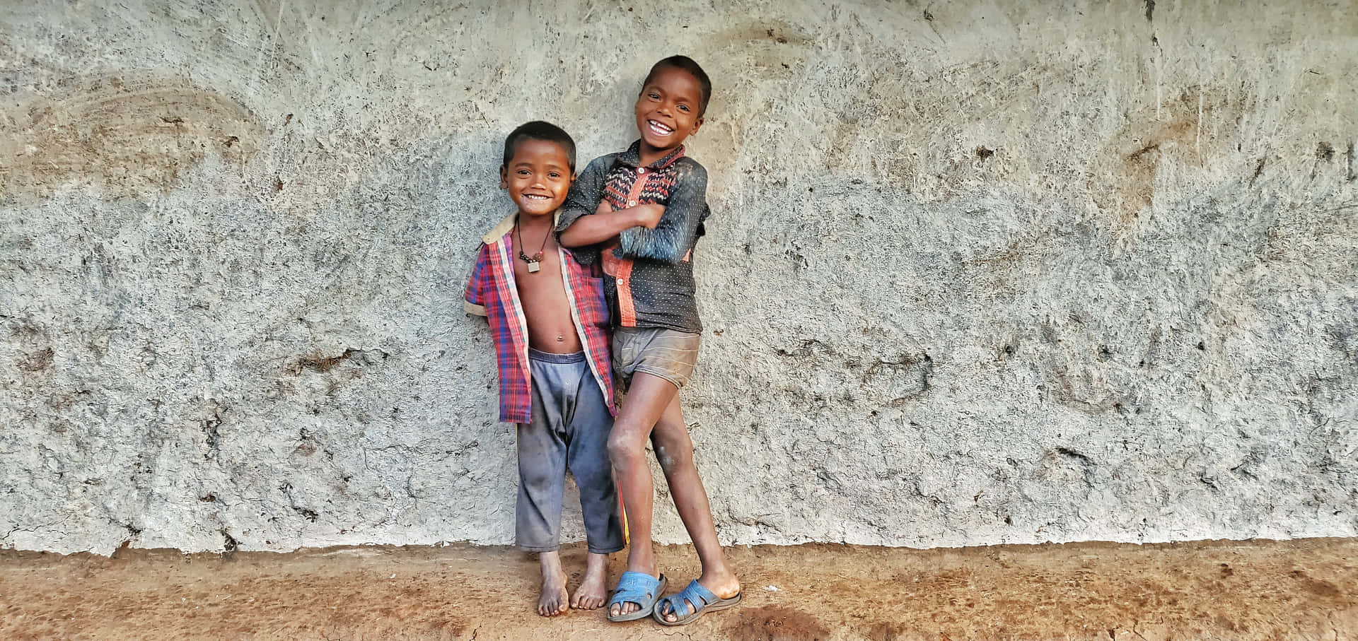 Young Indian Boys Leaning On The Wall Picture