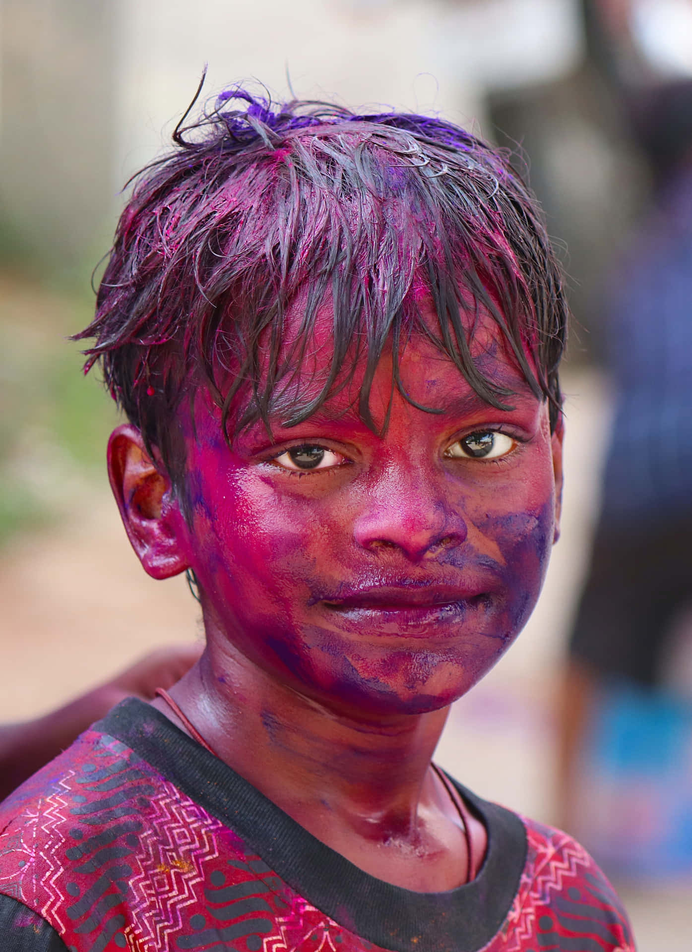 Young Indian Boy With Paint Picture