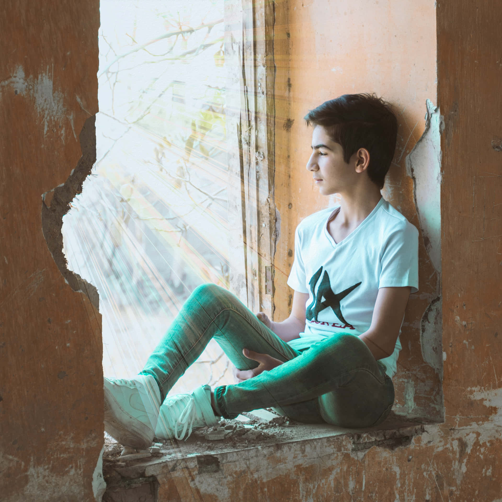 Indian Boy Sitting By The Window Picture
