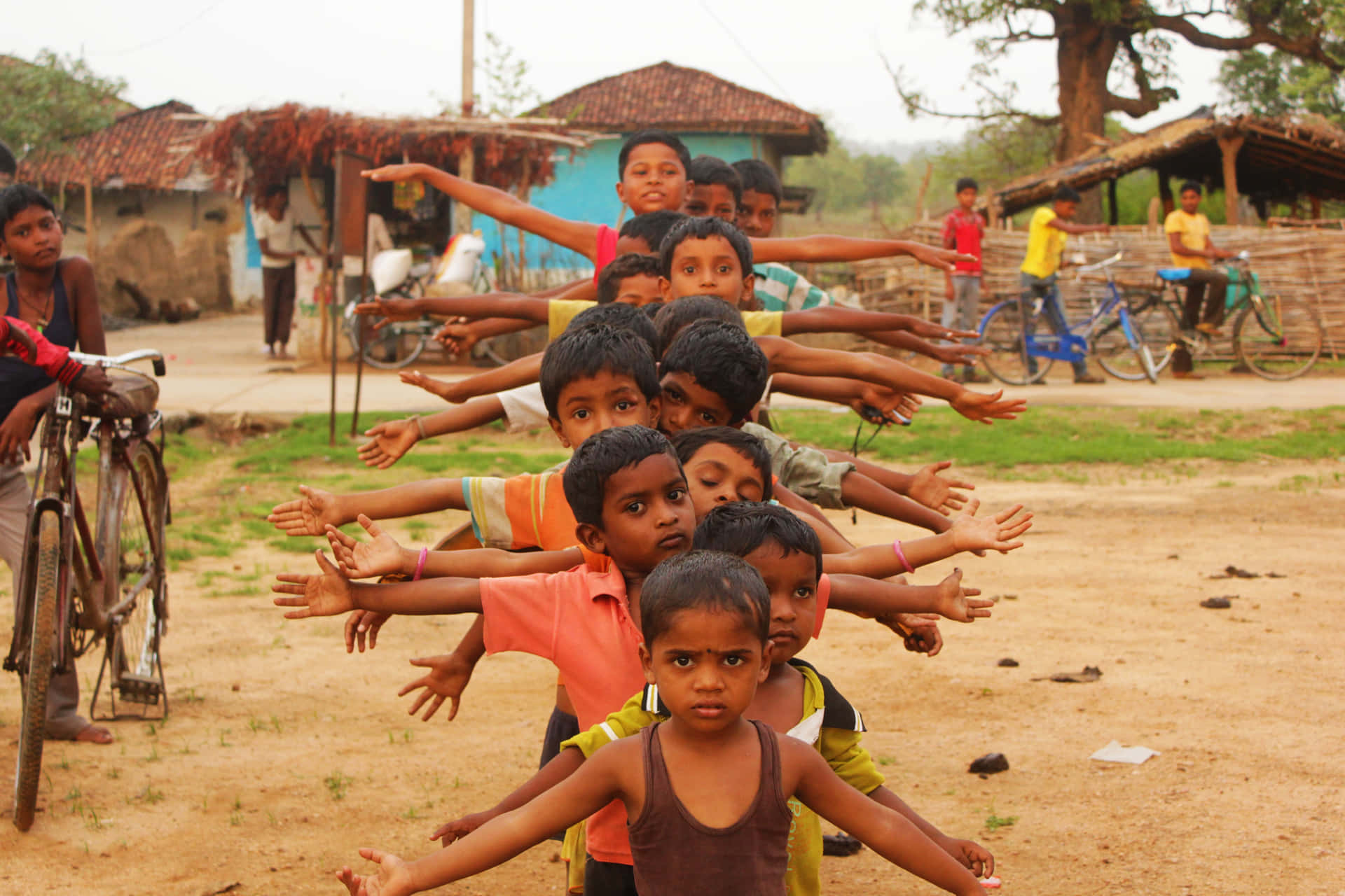 Indian Boys Outstretching Their Hands Picture