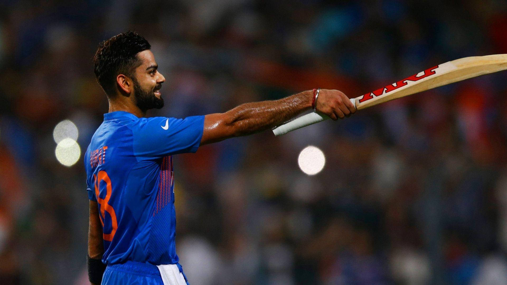 Indian Cricket Team Member Kohli Points At Crowd Wallpaper