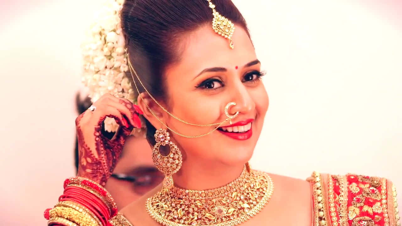 A Bride In Traditional Indian Attire Smiling