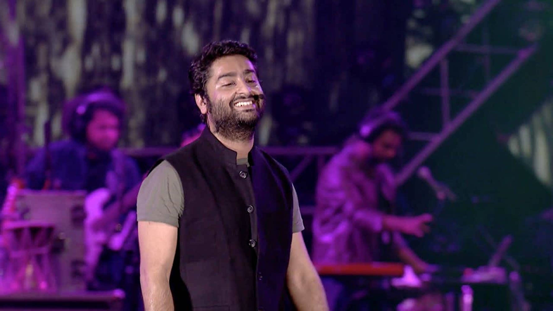 Indian Singer Arijit Singh Candid Smile Background