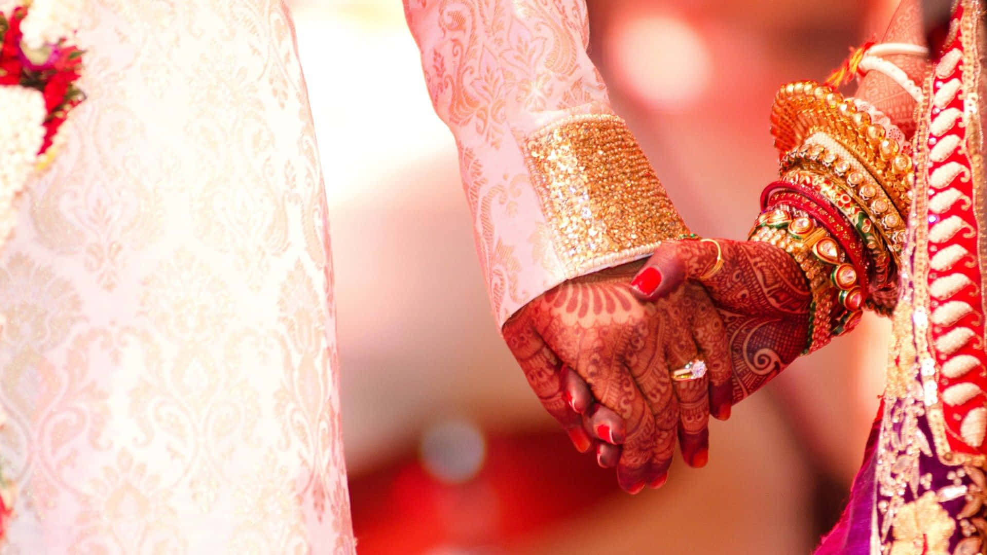 A Bride And Groom Holding Hands In A Wedding Ceremony