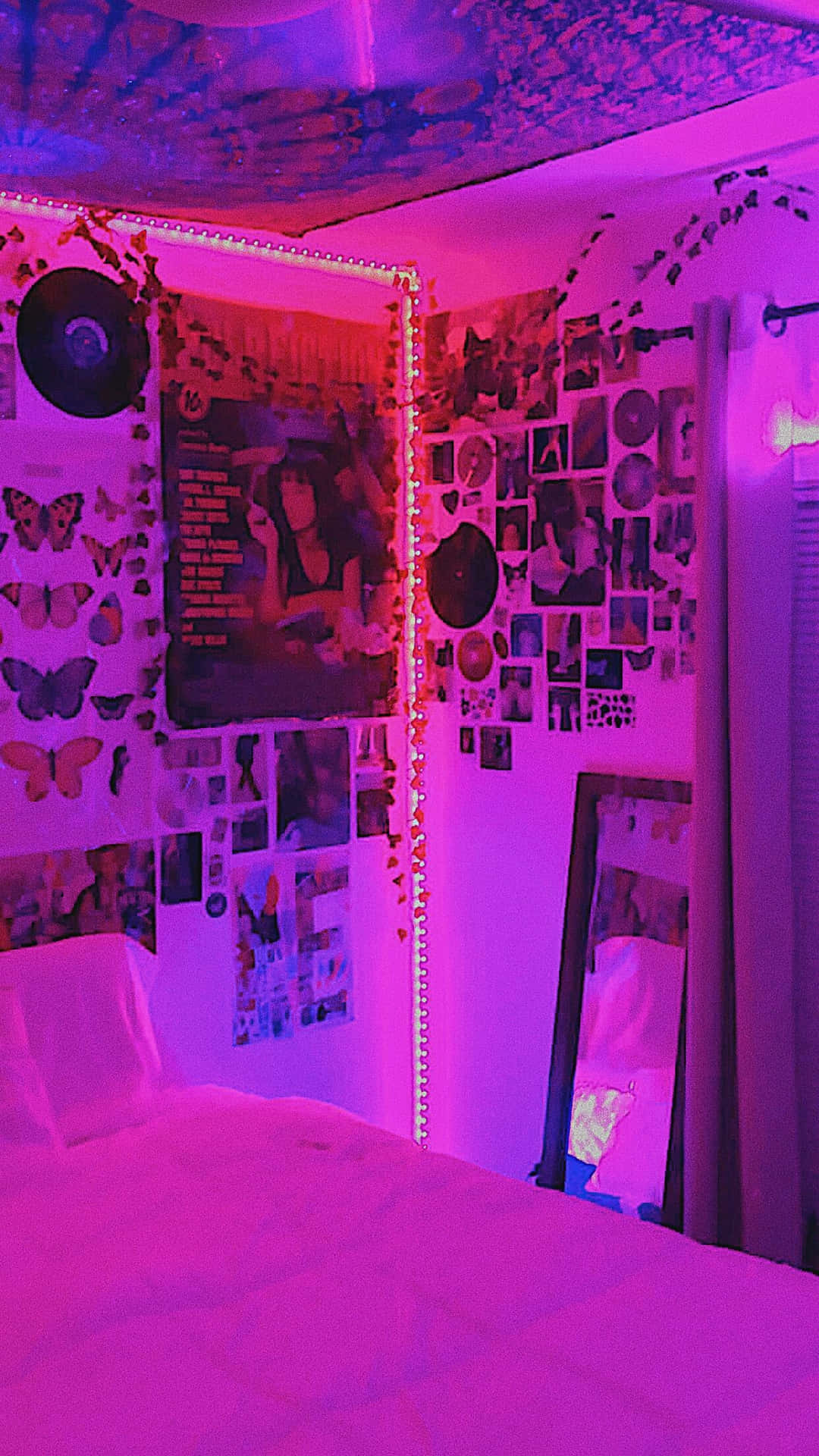 A Bed With A Pink Light On It