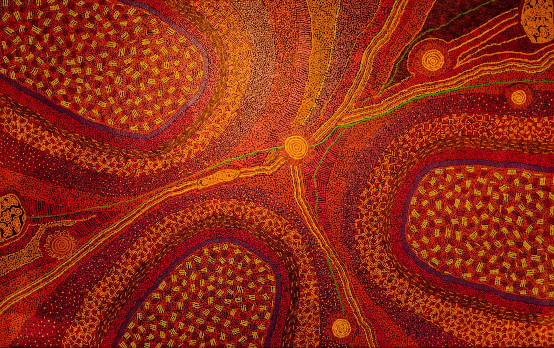 An Aboriginal Painting With Red And Orange Colors