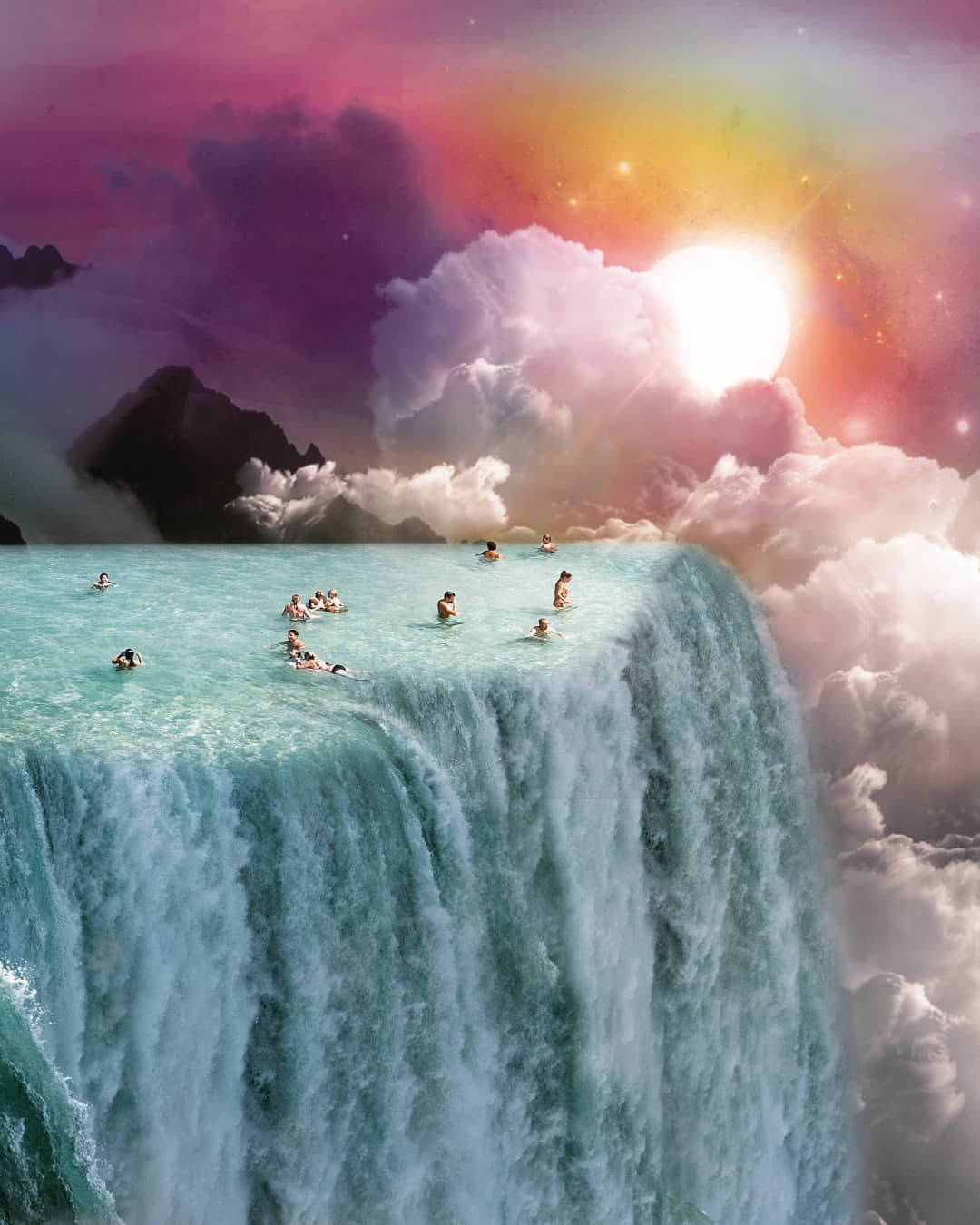 A Waterfall With People Swimming In It Wallpaper