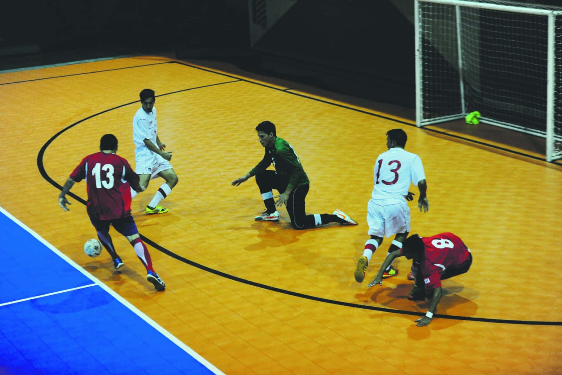 Indoor Soccer Match Action Wallpaper