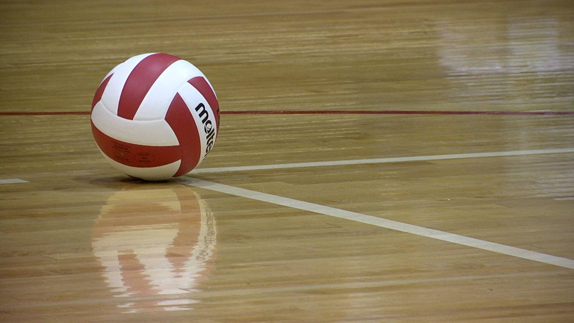 Jump and Spike Your Way to Victory with Indoor Volleyball Wallpaper