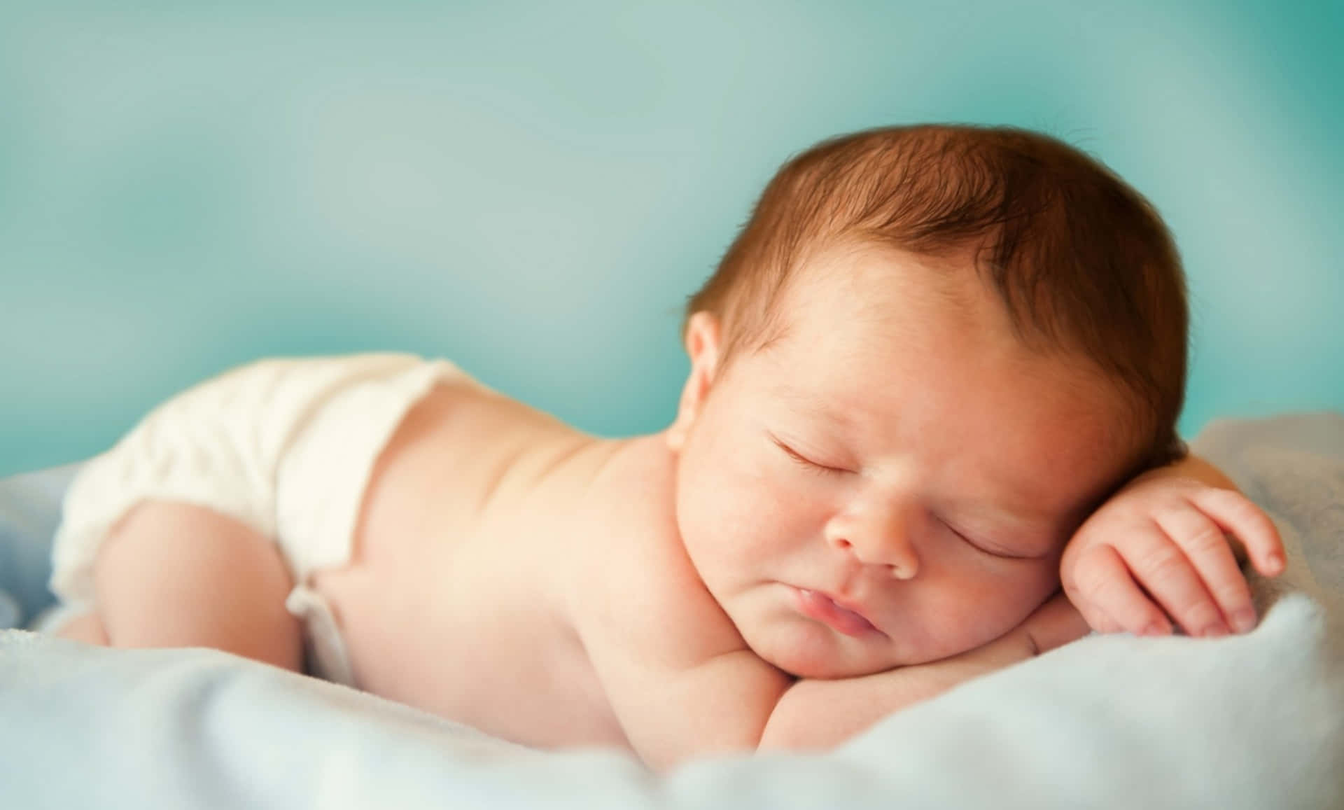 "Adorable infant sleeping peacefully"