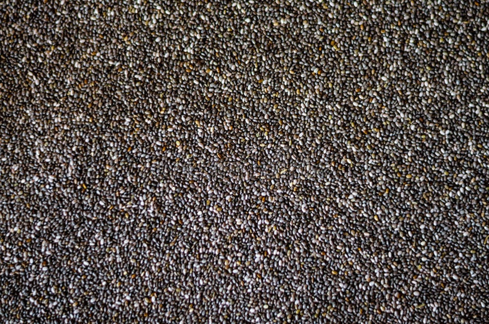 Vibrant Display of Nutritious Chia Seeds Wallpaper