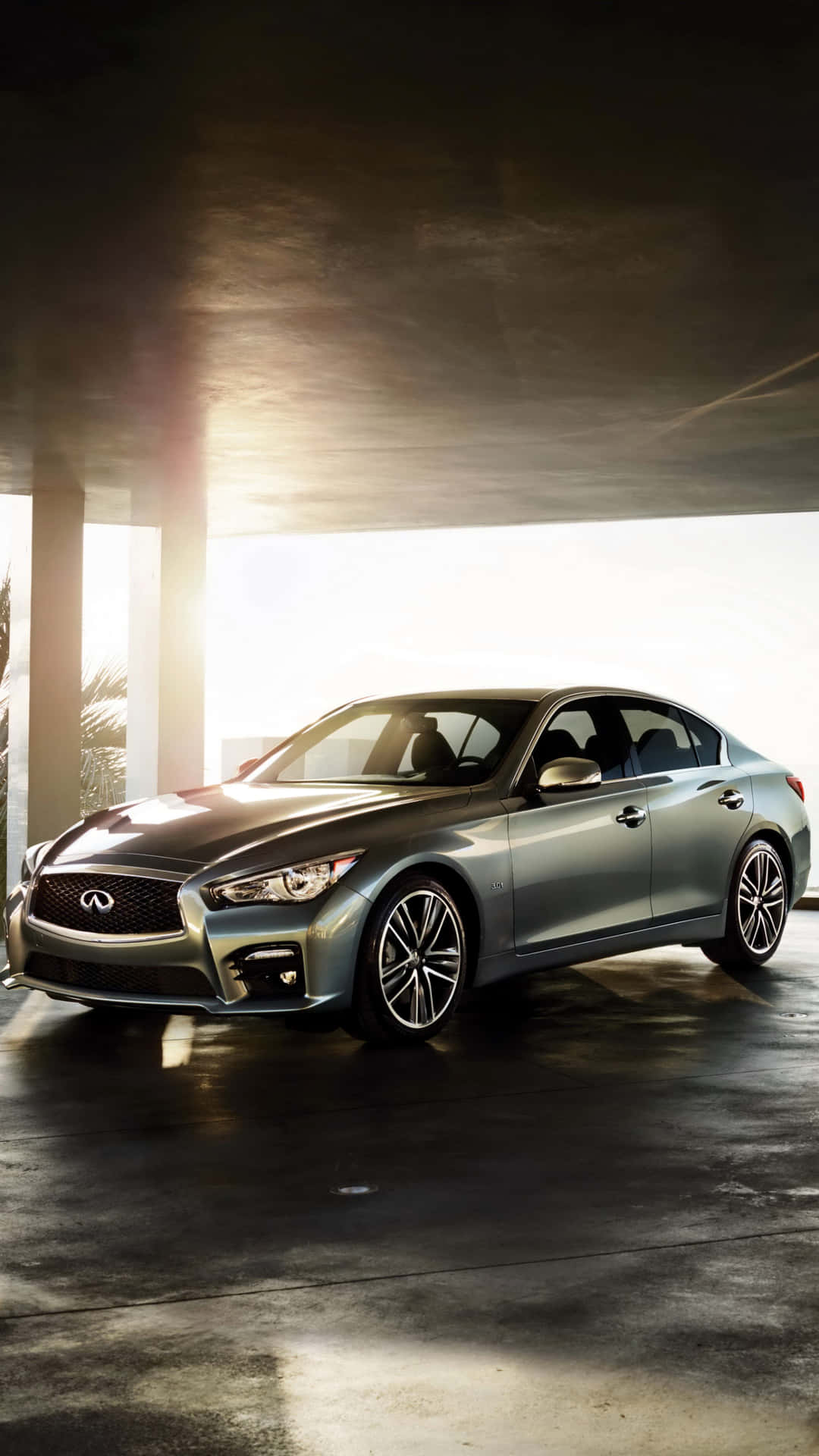 The 2016 Infiniti Q50 Is Parked In A Garage Wallpaper