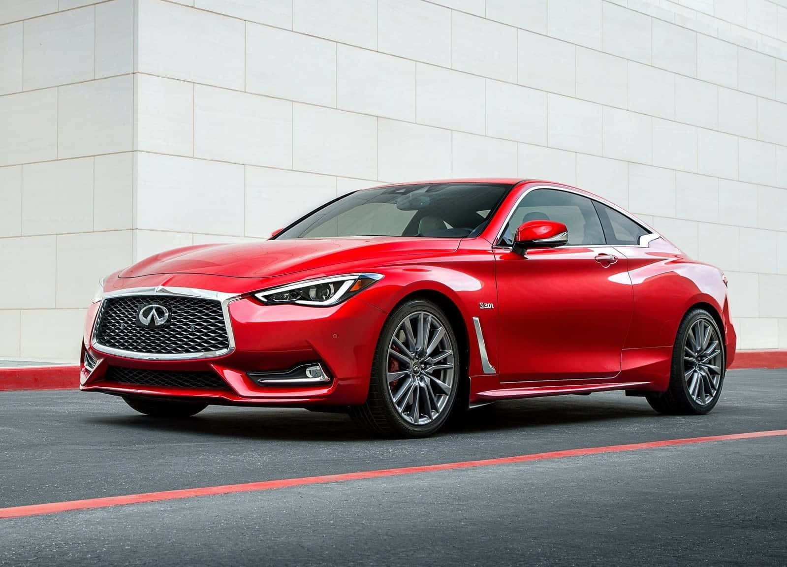 Sleek Infiniti Q60 Sports Coupe in Action Wallpaper