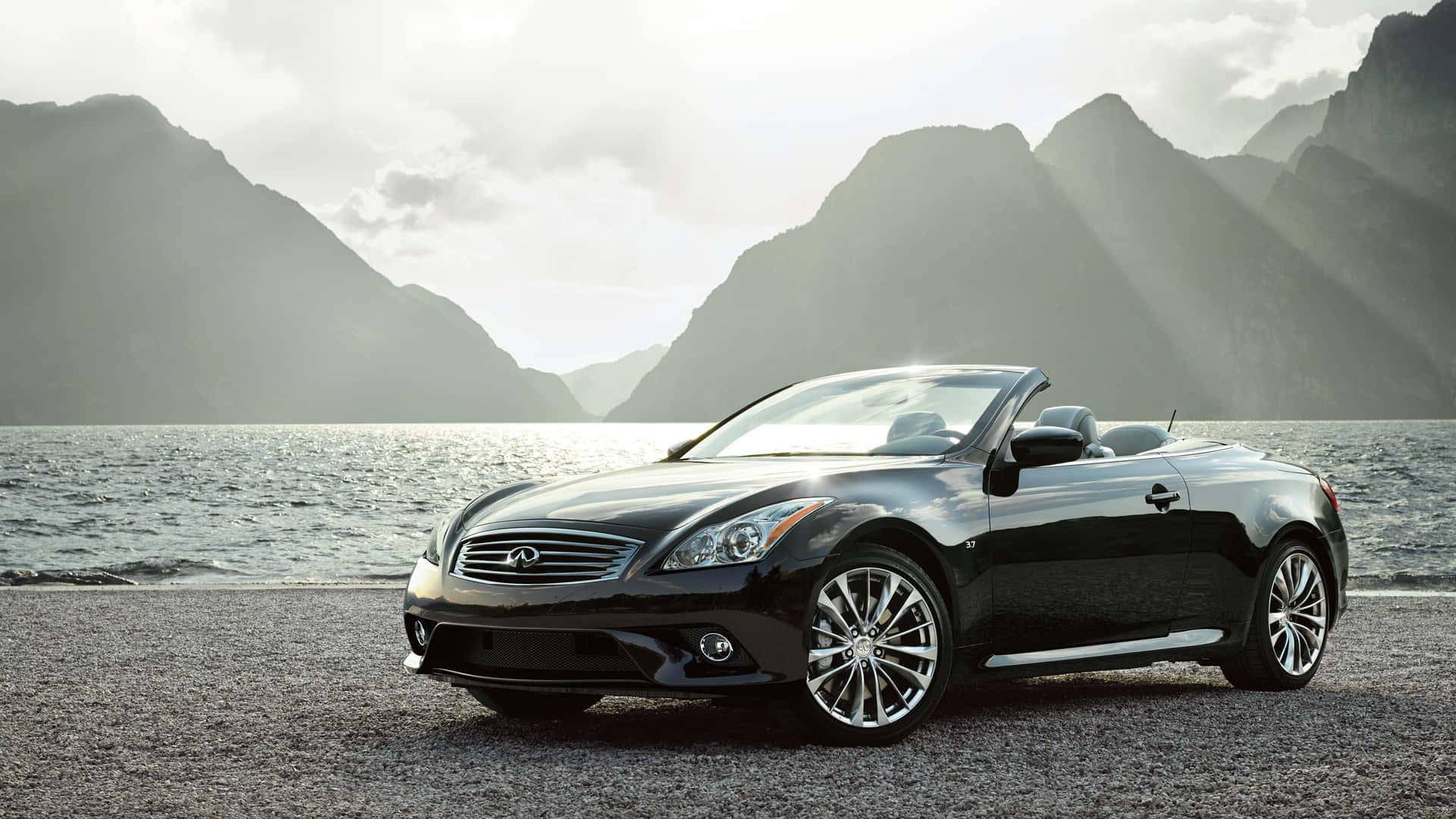 Stunning Red Infiniti Q60 Coupe on Open Road Wallpaper