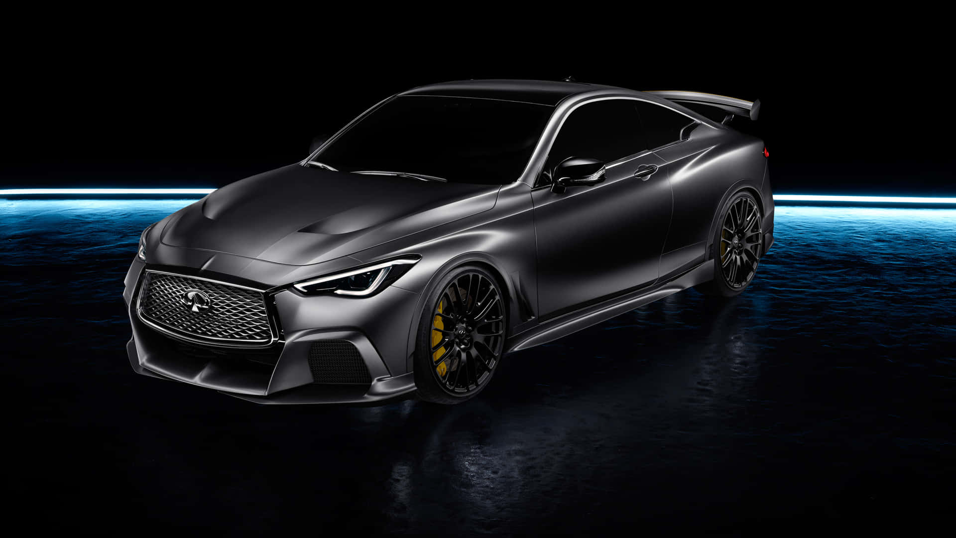 Caption: Sleek and Stylish Infiniti Q60 on the road Wallpaper