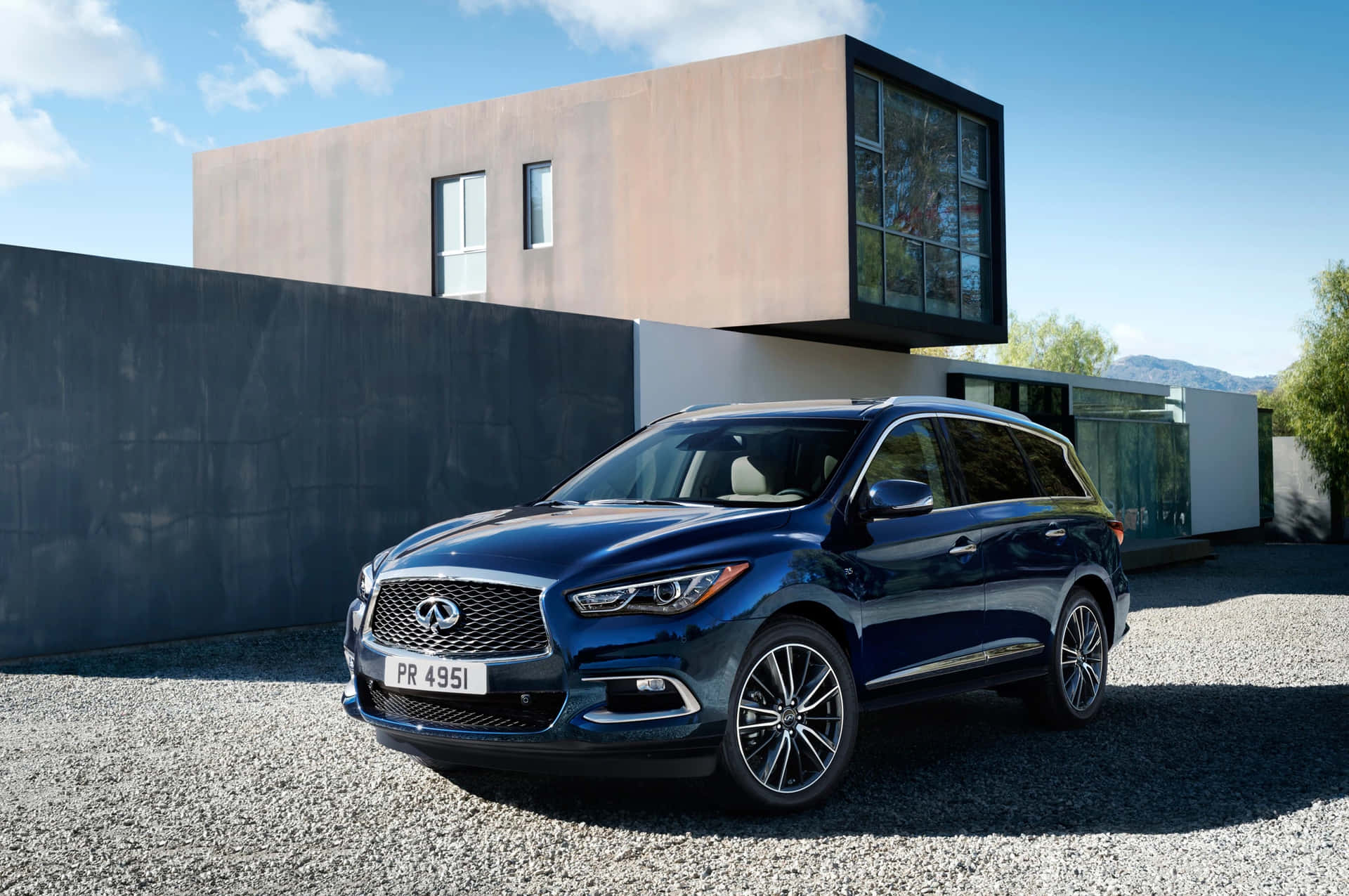 Sleek and Sophisticated Infiniti QX60 on the Road Wallpaper